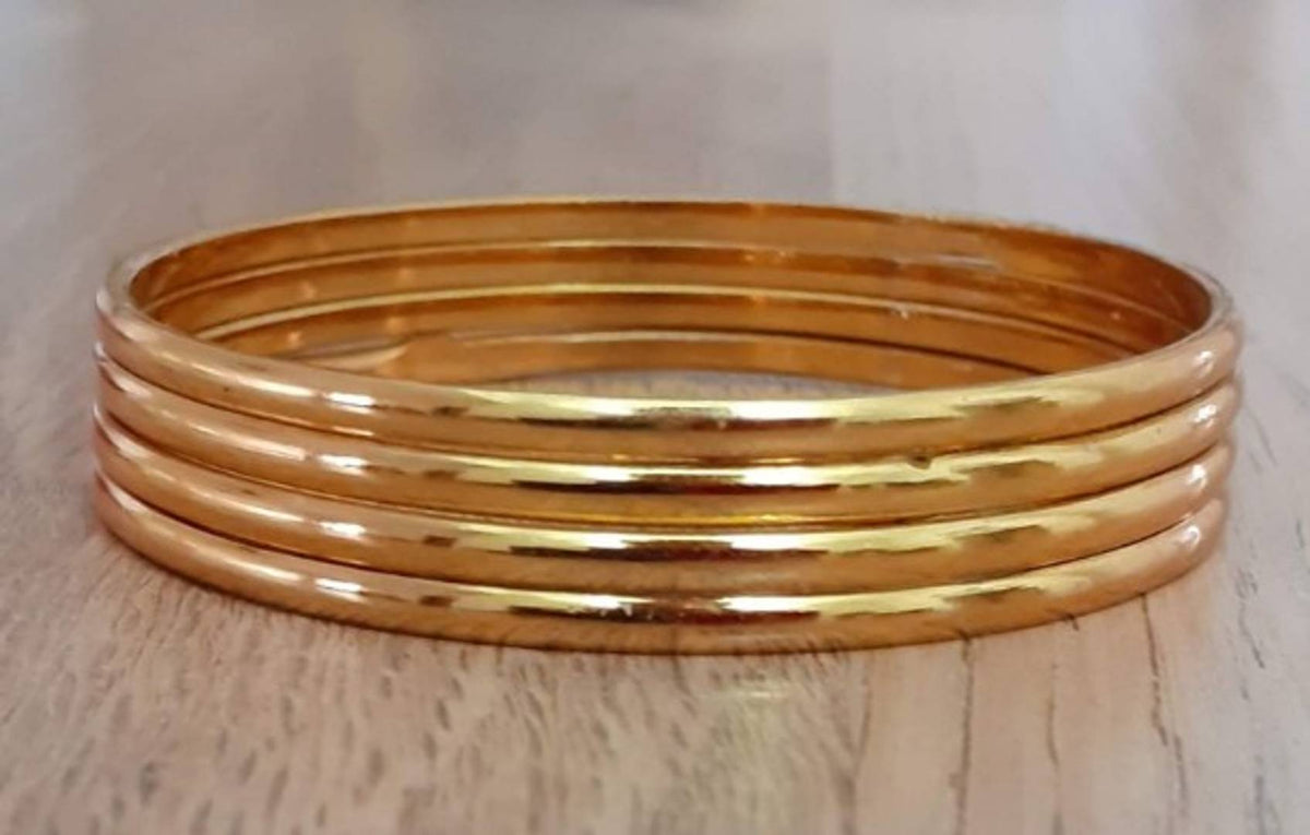 Copper based on sale gold bangles