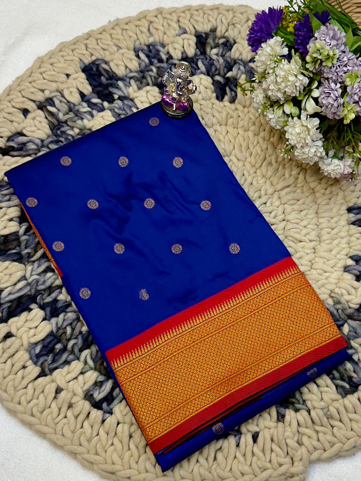 Shop Shloka Kalanjali Paithani Saree in Katan Silk with all-over zari butti, dual side border, and blouse piece. Perfect for weddings &amp; festive wear.