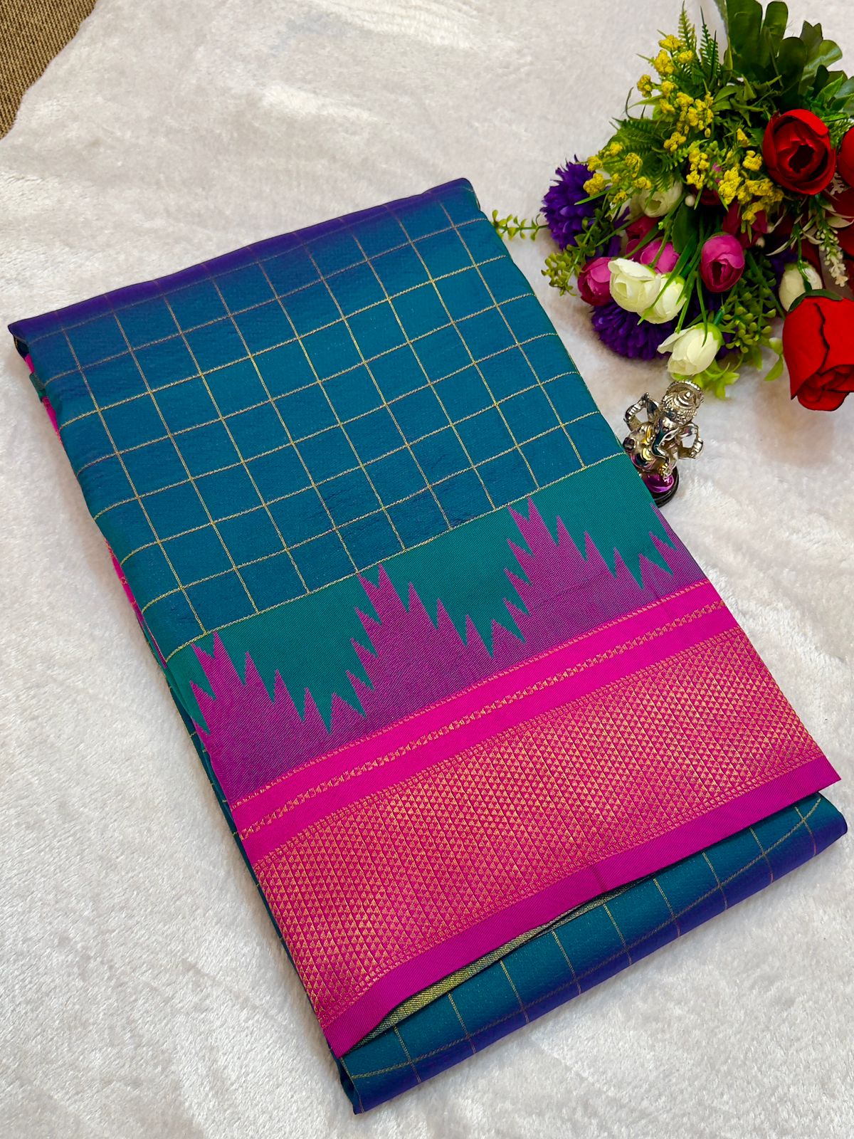 New Design Launching Shop the elegant Neha Checks Irkal Paithani Saree, crafted from premium Katan silk that feels like pure silk. Designed with all-over classic checks and paired with an exclusive contrast blouse, this saree is perfect for festive wear, weddings, and special occasions. Experience tradition with a modern touch.