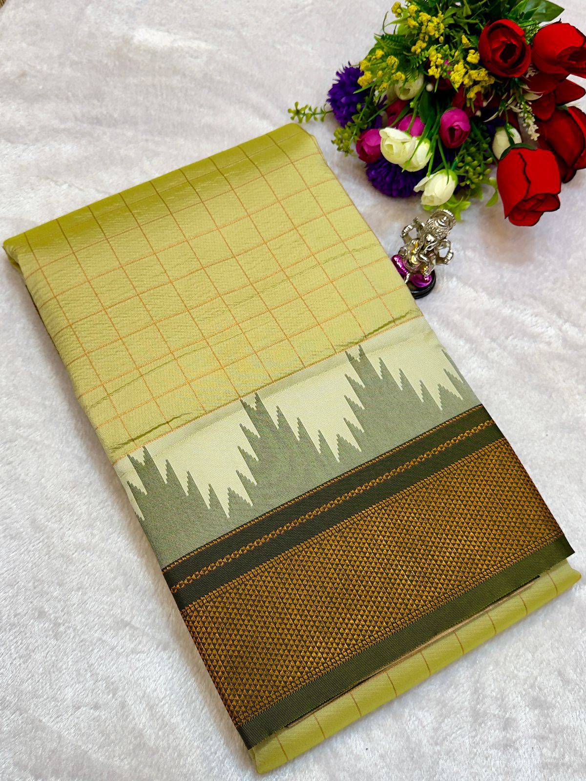 New Design Launching Shop the elegant Neha Checks Irkal Paithani Saree, crafted from premium Katan silk that feels like pure silk. Designed with all-over classic checks and paired with an exclusive contrast blouse, this saree is perfect for festive wear, weddings, and special occasions. Experience tradition with a modern touch.