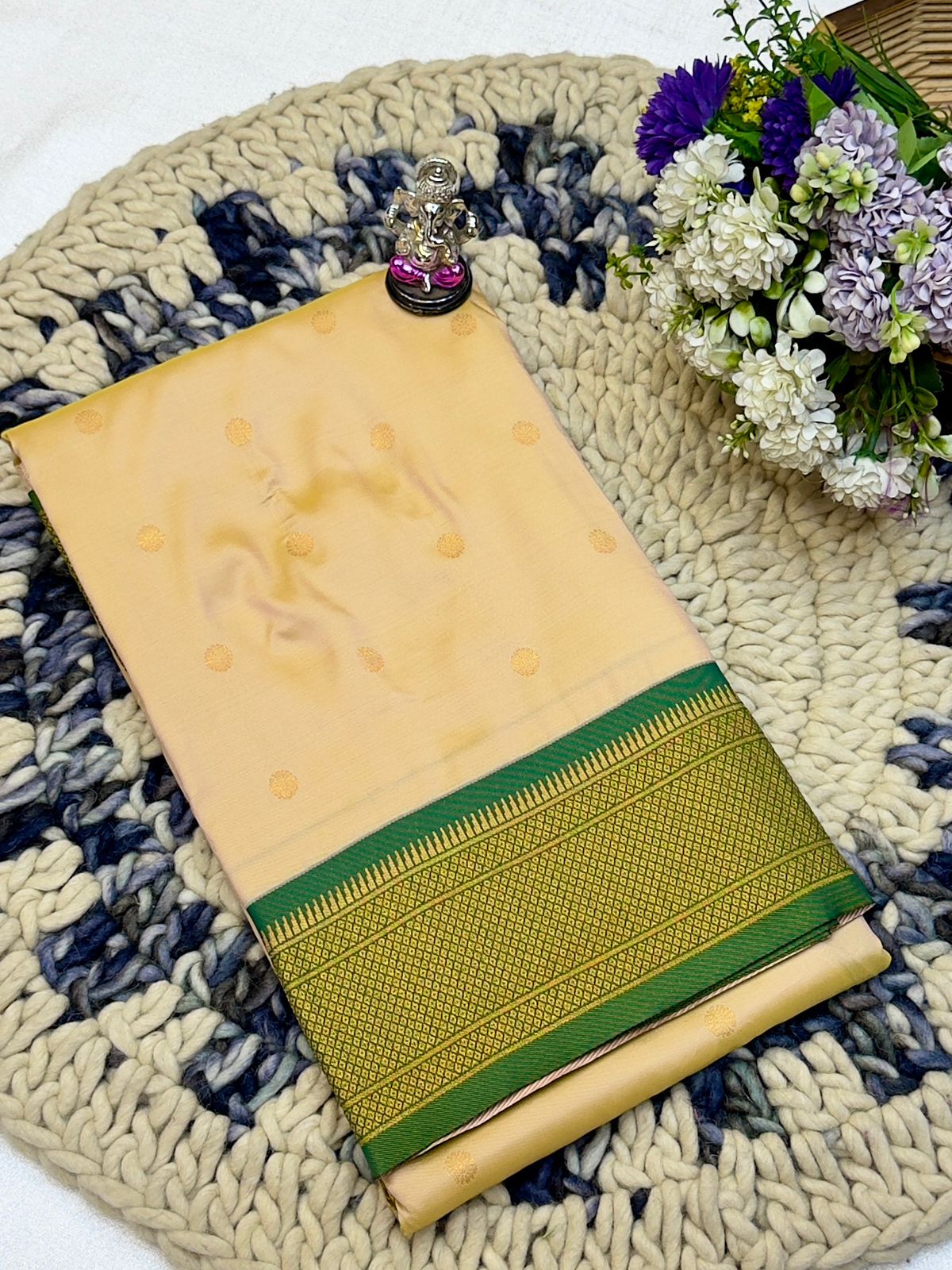Shop Shloka Kalanjali Paithani Saree in Katan Silk with all-over zari butti, dual side border, and blouse piece. Perfect for weddings &amp; festive wear.