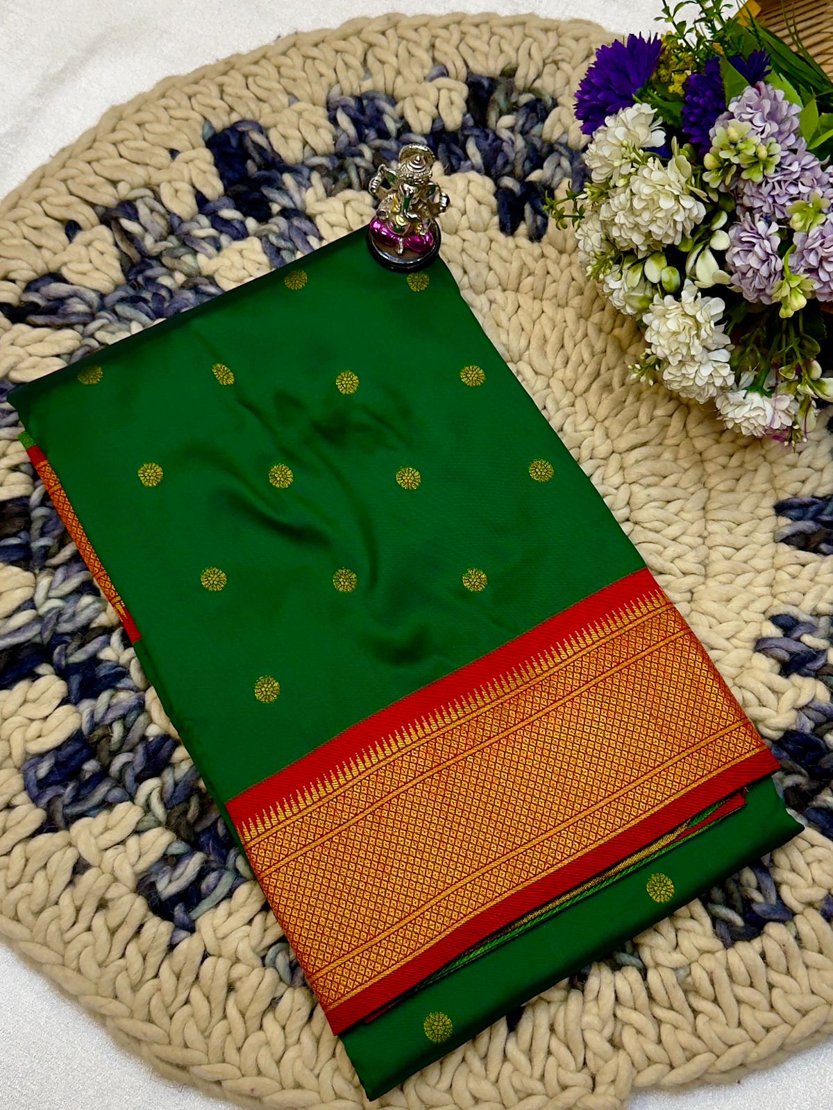 Shop Shloka Kalanjali Paithani Saree in Katan Silk with all-over zari butti, dual side border, and blouse piece. Perfect for weddings &amp; festive wear.