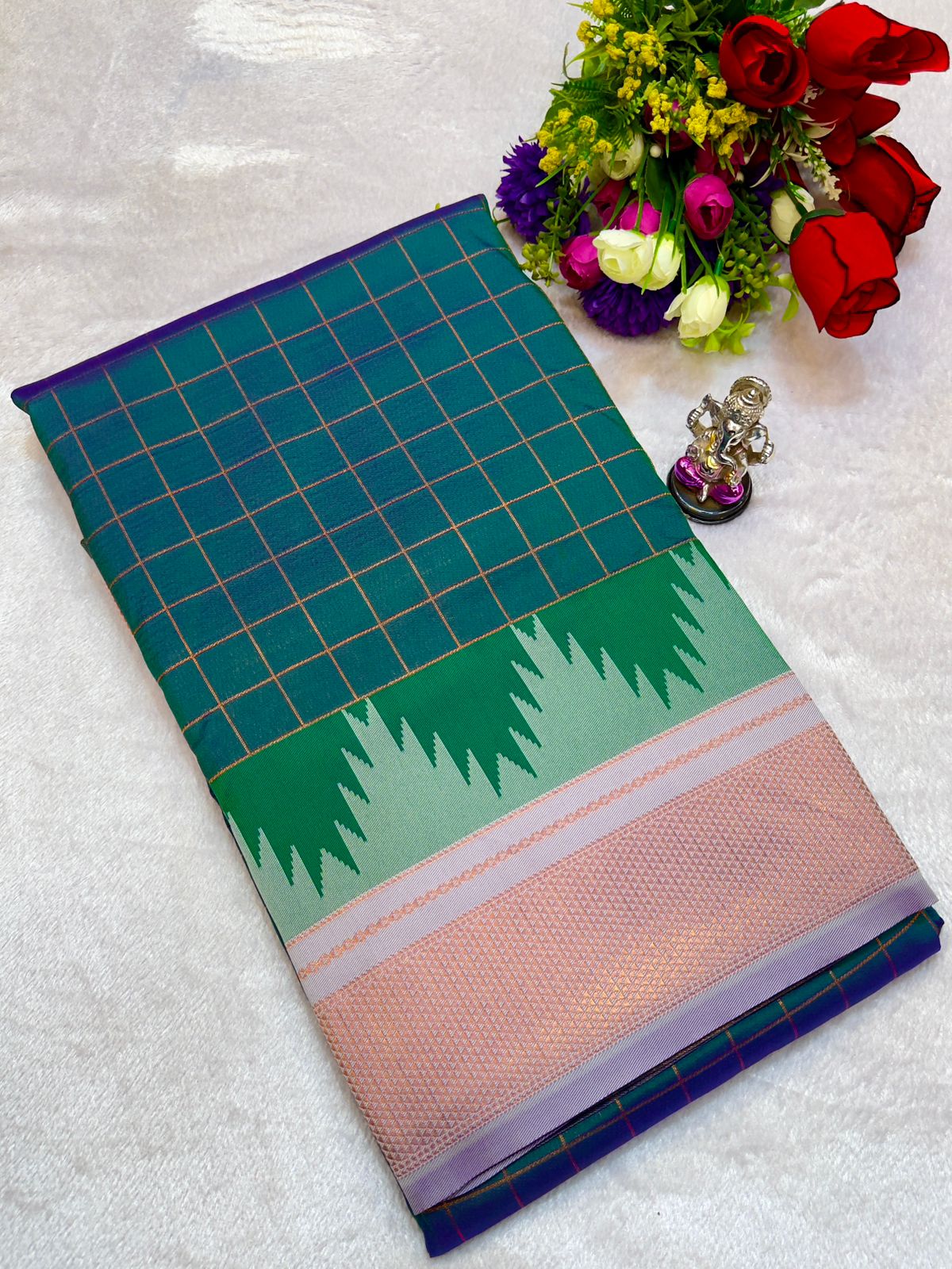 New Design Launching Shop the elegant Neha Checks Irkal Paithani Saree, crafted from premium Katan silk that feels like pure silk. Designed with all-over classic checks and paired with an exclusive contrast blouse, this saree is perfect for festive wear, weddings, and special occasions. Experience tradition with a modern touch.