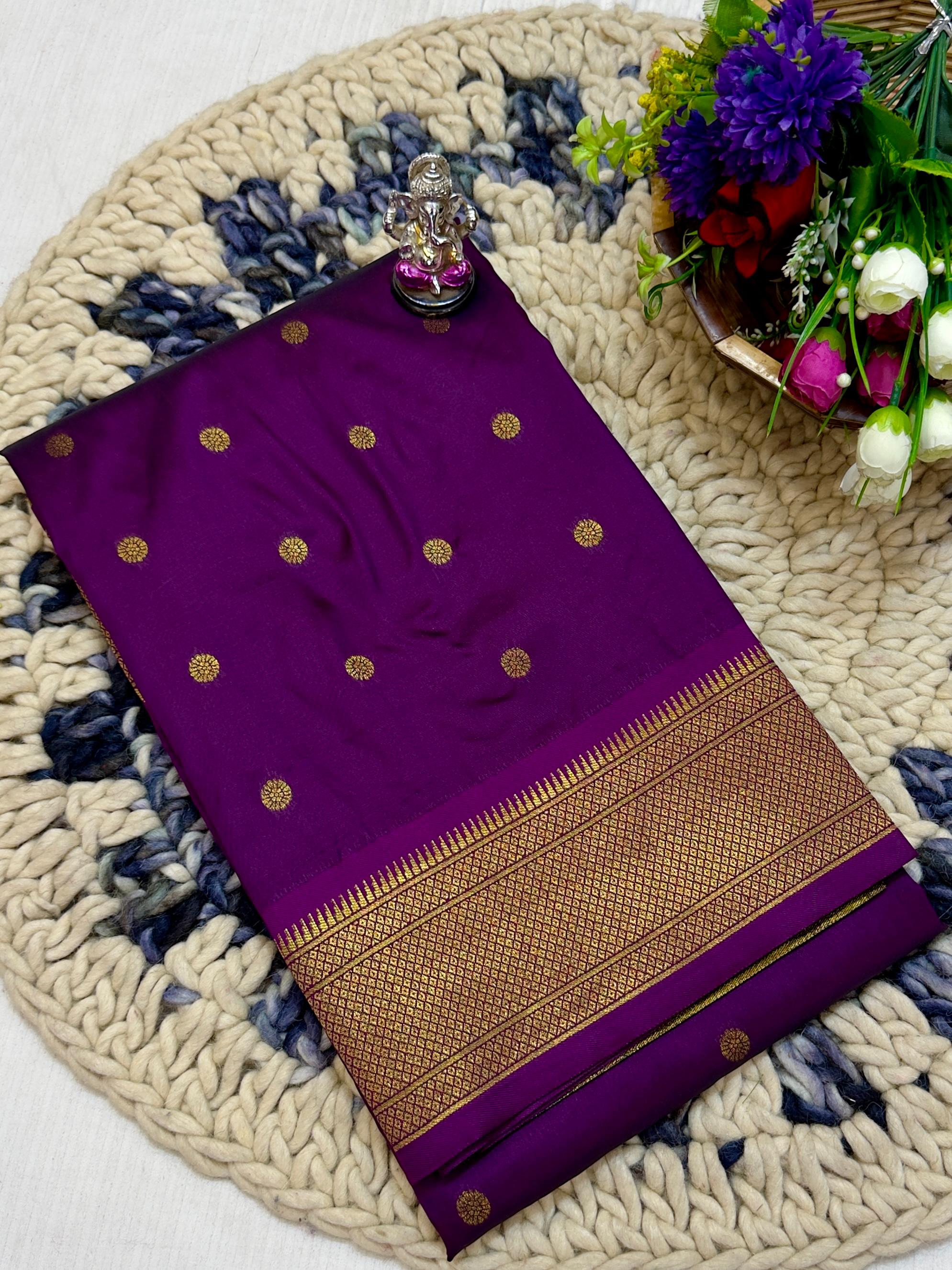 Shop Shloka Kalanjali Paithani Saree in Katan Silk with all-over zari butti, dual side border, and blouse piece. Perfect for weddings &amp; festive wear.