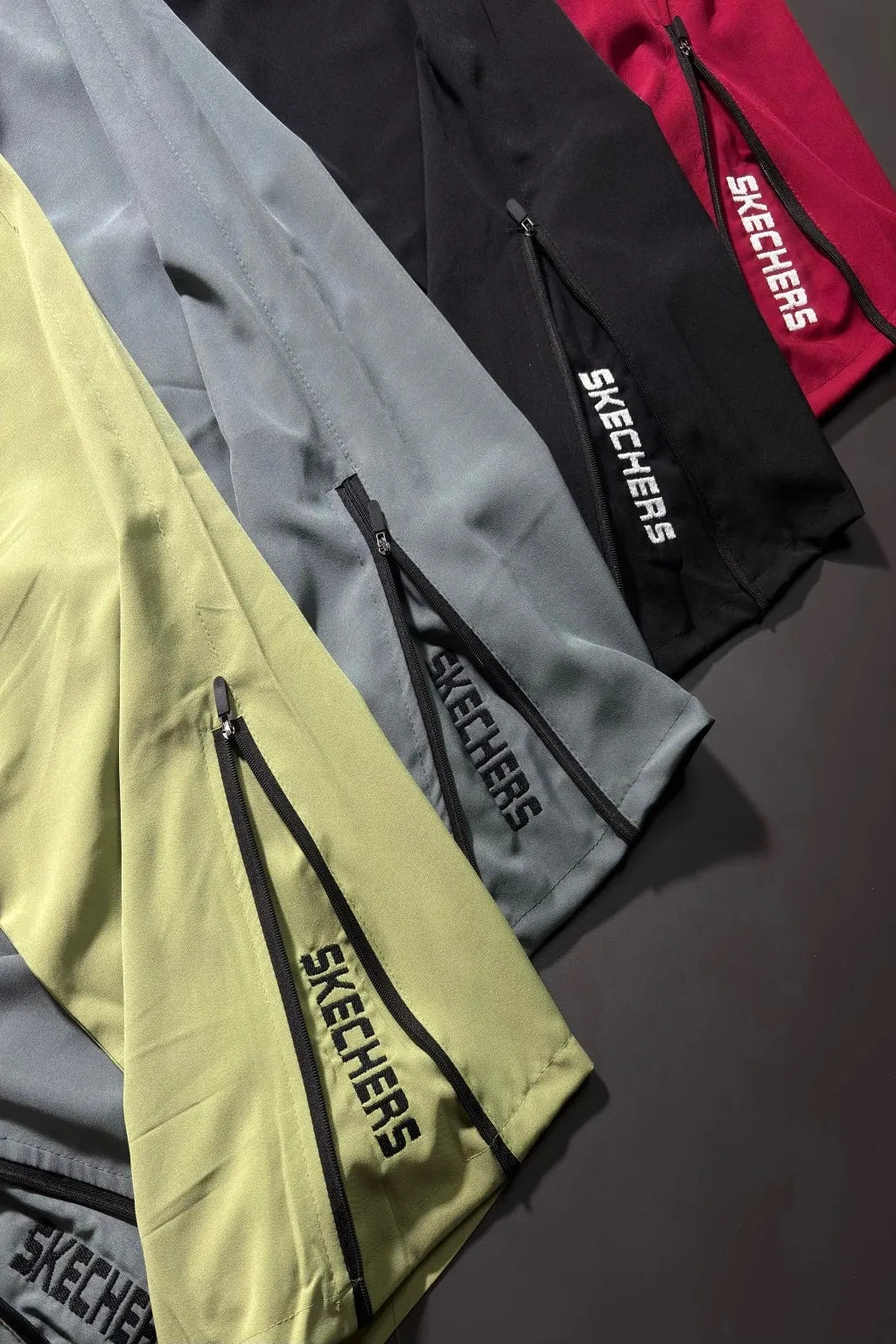 Upgrade your everyday style with our 100% Premium Jordan Lycra Trackpants by SKECHERS. Designed for performance and comfort, these trackpants offer a sleek boot-cut fit with premium stretch fabric that moves with you.
