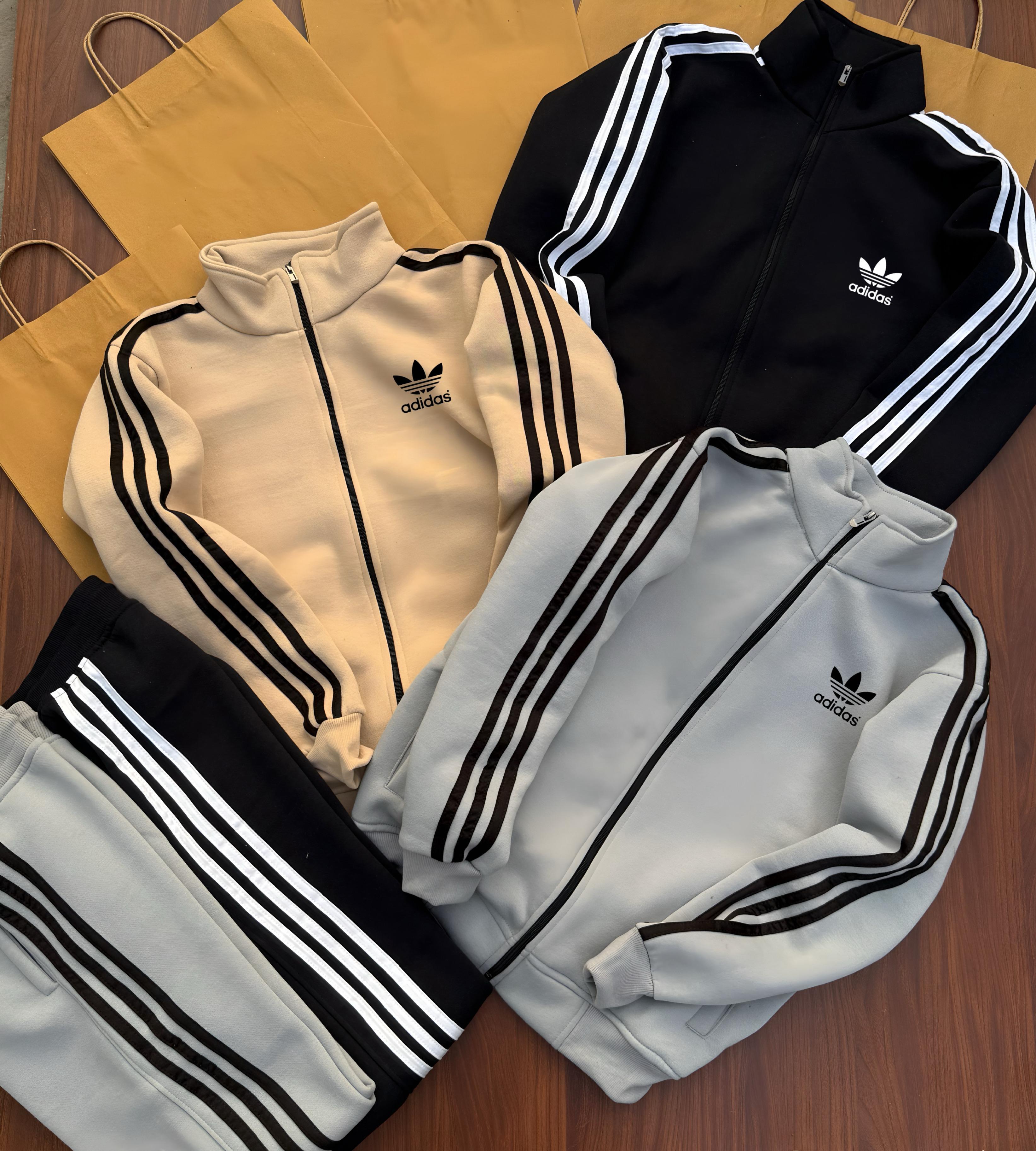 Stay warm and stylish this winter with our premium-quality ADIDAS zipper tracksuit, crafted for maximum comfort and durability.