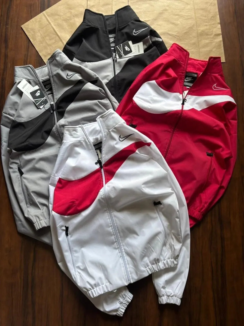 Stay protected in style with the&nbsp;Nike Premium Windchitter, crafted from high-grade TPU fabric for a sleek look and lasting performance. Designed with a Rise Net inner lining, it offers exceptional comfort and breathability, perfect for all-day wear.