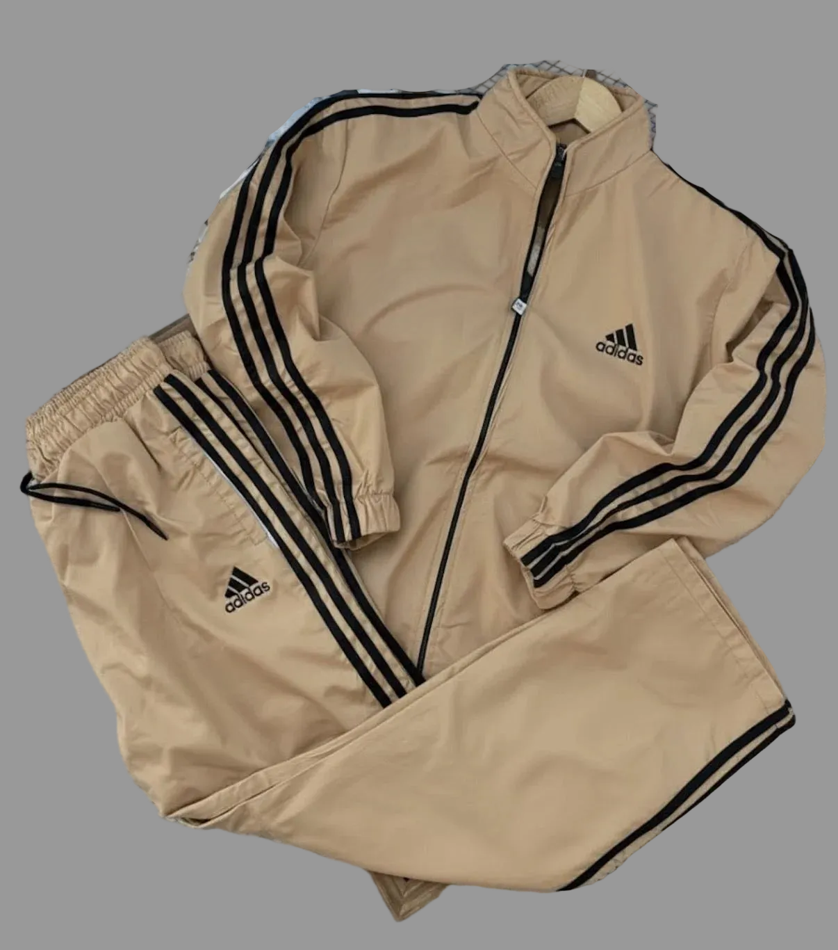 Shop and Stay warm and stylish this winter with our 100% Premium Quality Waterproof Tracksuit, designed for comfort, durability, and a modern athletic look.