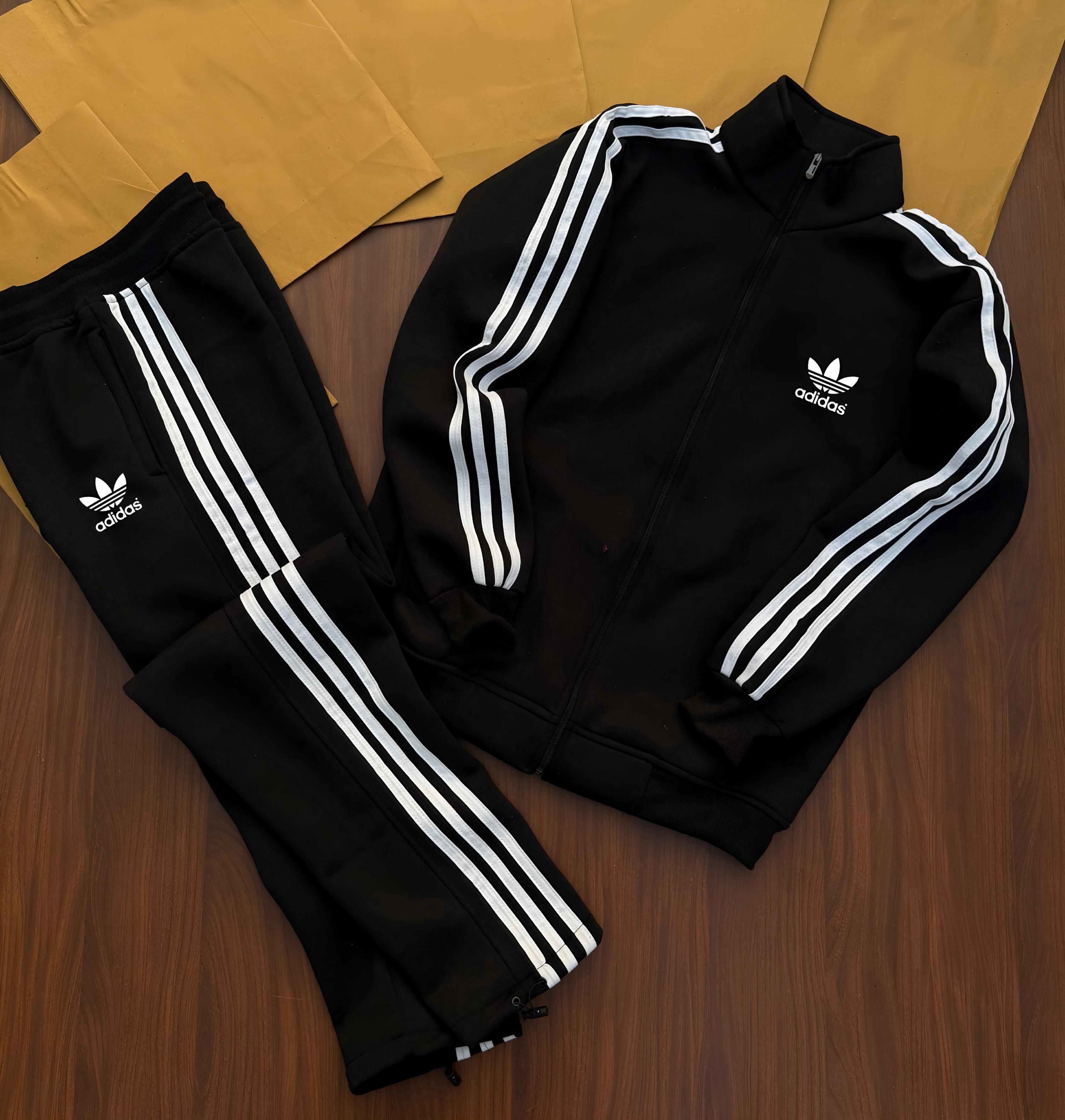 Stay warm and stylish this winter with our premium-quality ADIDAS zipper tracksuit, crafted for maximum comfort and durability.