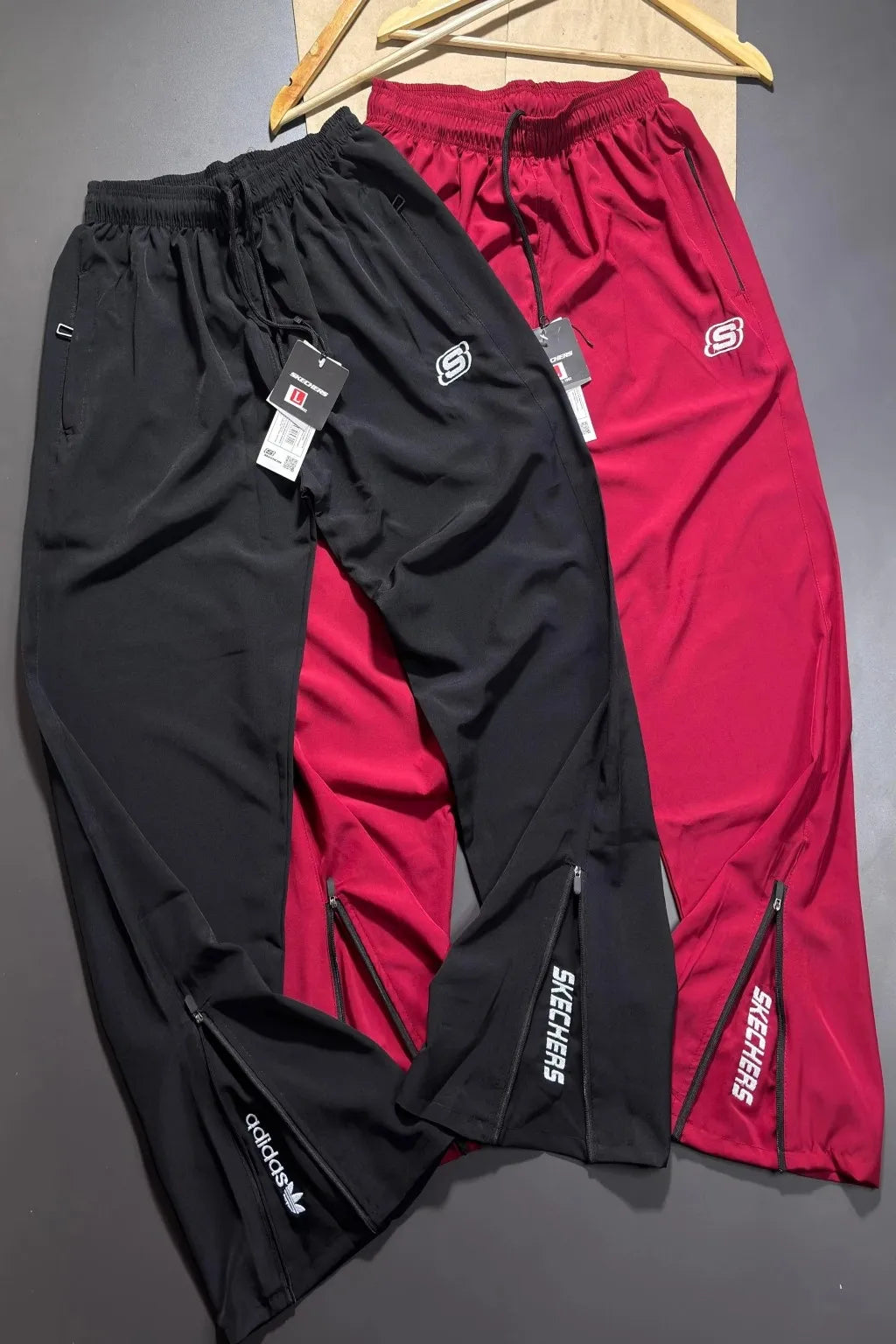 Upgrade your everyday style with our 100% Premium Jordan Lycra Trackpants by SKECHERS. Designed for performance and comfort, these trackpants offer a sleek boot-cut fit with premium stretch fabric that moves with you.