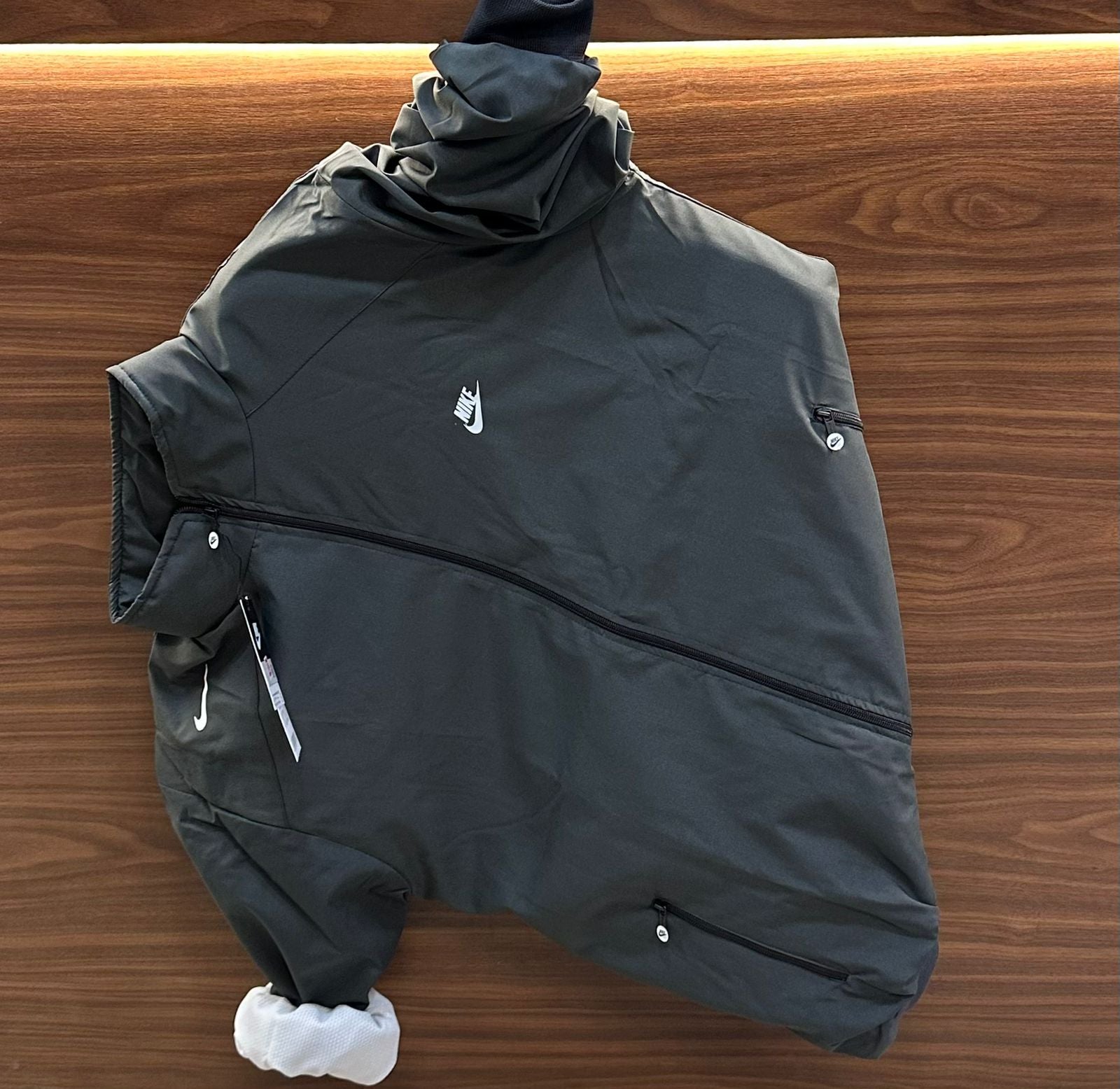 Stay protected in style with the Nike Premium Windcheater, crafted from high-quality TPU soft and smooth fabric. Designed for comfort, durability, and trend-setting looks — perfect for all-season wear.