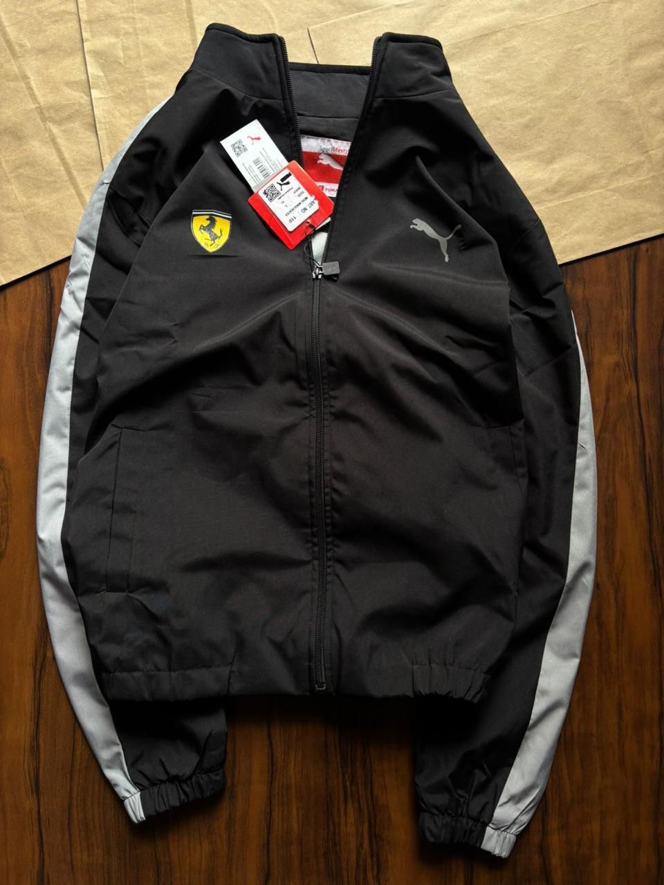 Premium Puma Inside Net Jacket crafted with durable TPU fabric and elegant embroidery work. Stylish, comfortable, and perfect for all season