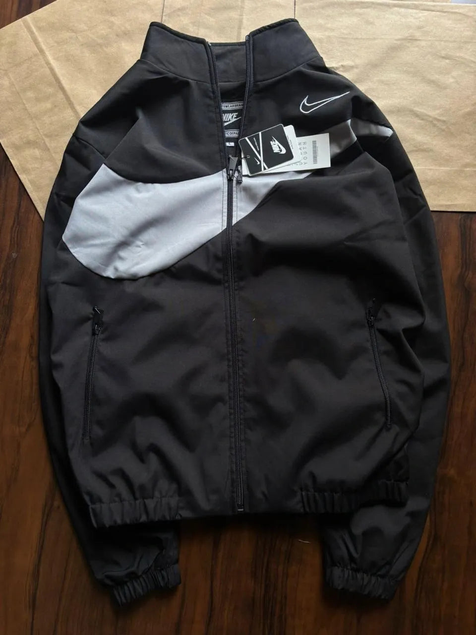 Stay protected in style with the&nbsp;Nike Premium Windchitter, crafted from high-grade TPU fabric for a sleek look and lasting performance. Designed with a Rise Net inner lining, it offers exceptional comfort and breathability, perfect for all-day wear.