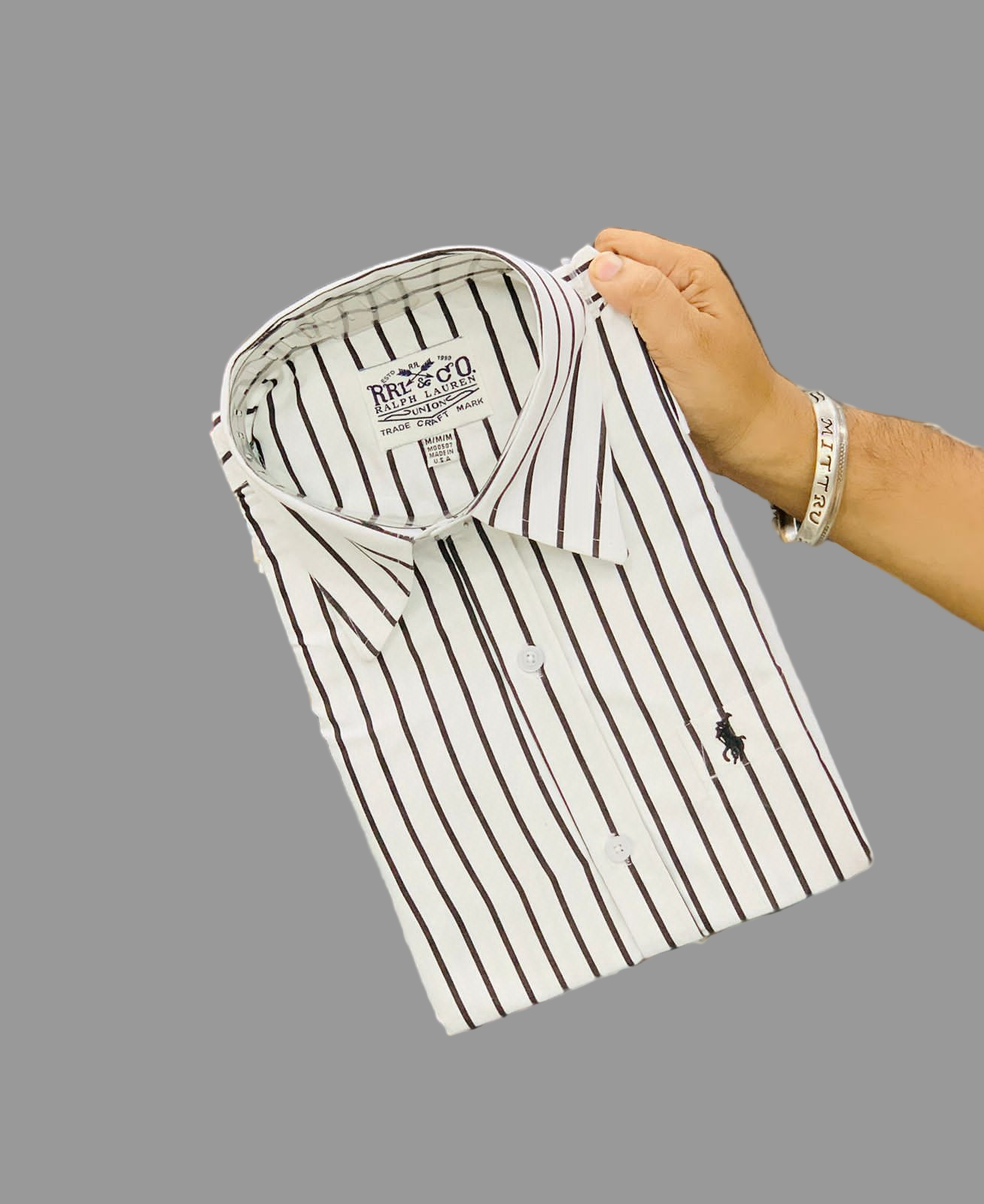 Upgrade your wardrobe with RL POLO’s Partywear Lining Shirt – where luxury meets style.