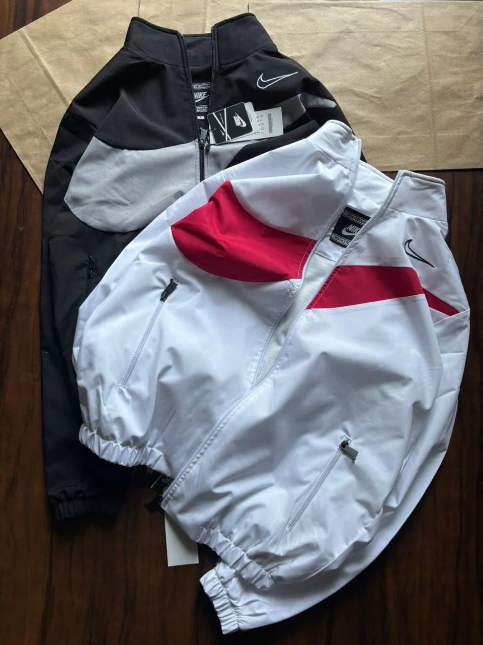 Stay protected in style with the&nbsp;Nike Premium Windchitter, crafted from high-grade TPU fabric for a sleek look and lasting performance. Designed with a Rise Net inner lining, it offers exceptional comfort and breathability, perfect for all-day wear.