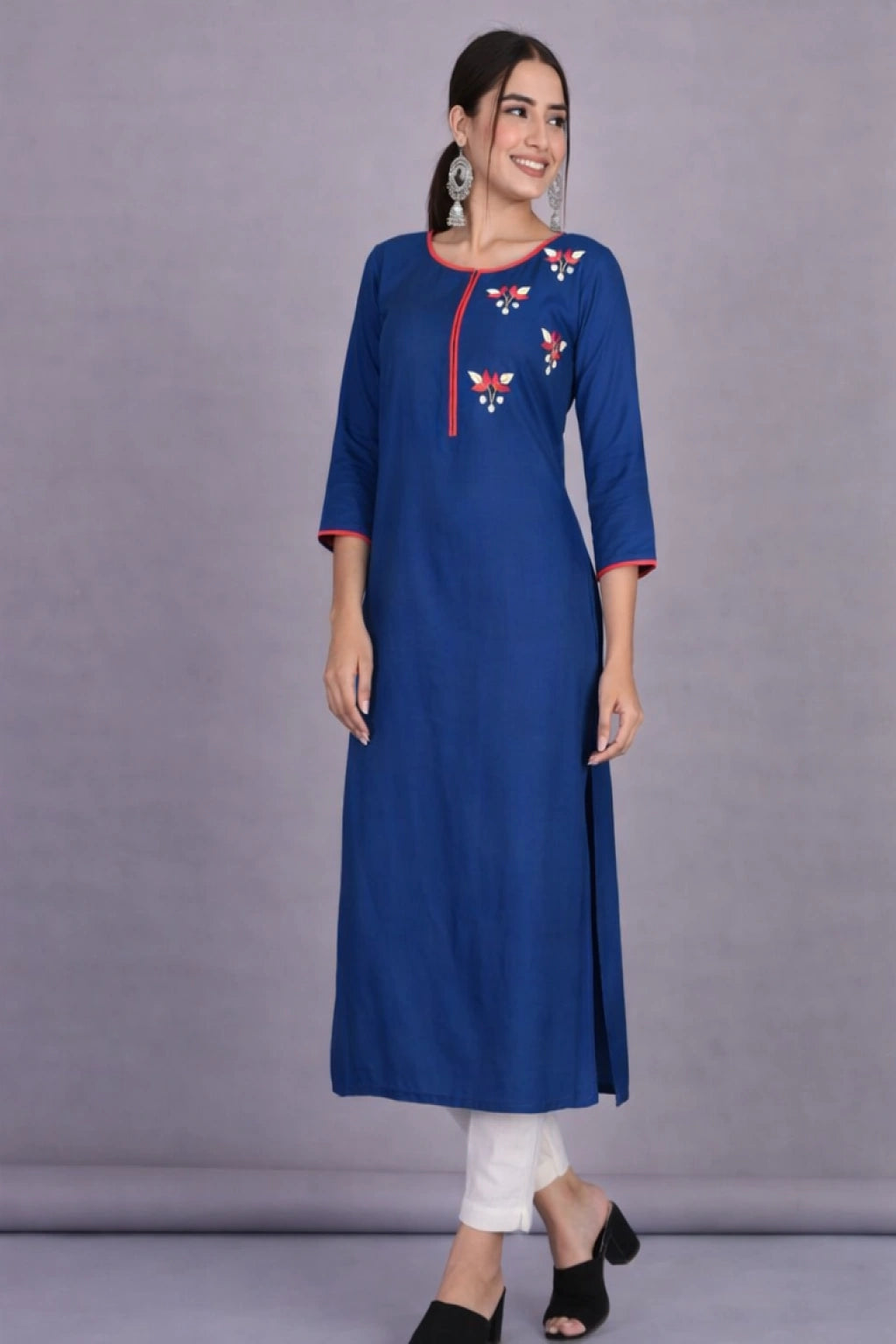 Shop elegant rayon straight cut kurti with hand embroidered floral motifs in red and blue. Comfortable ethnic wear for women available in M to 3XL.