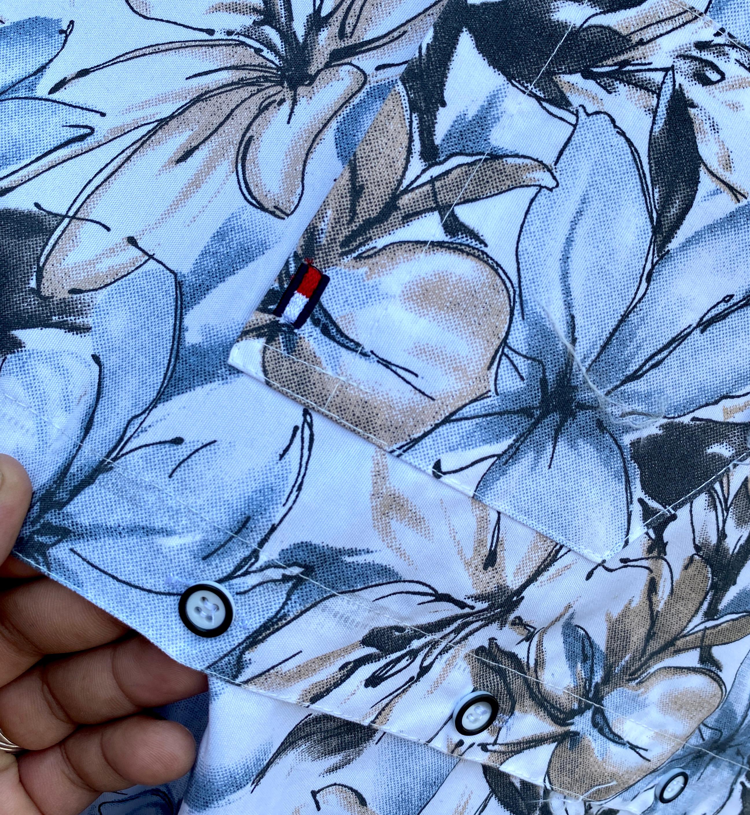 Elevate your festive look with this latest design printed shirt from Tommy Hilfiger