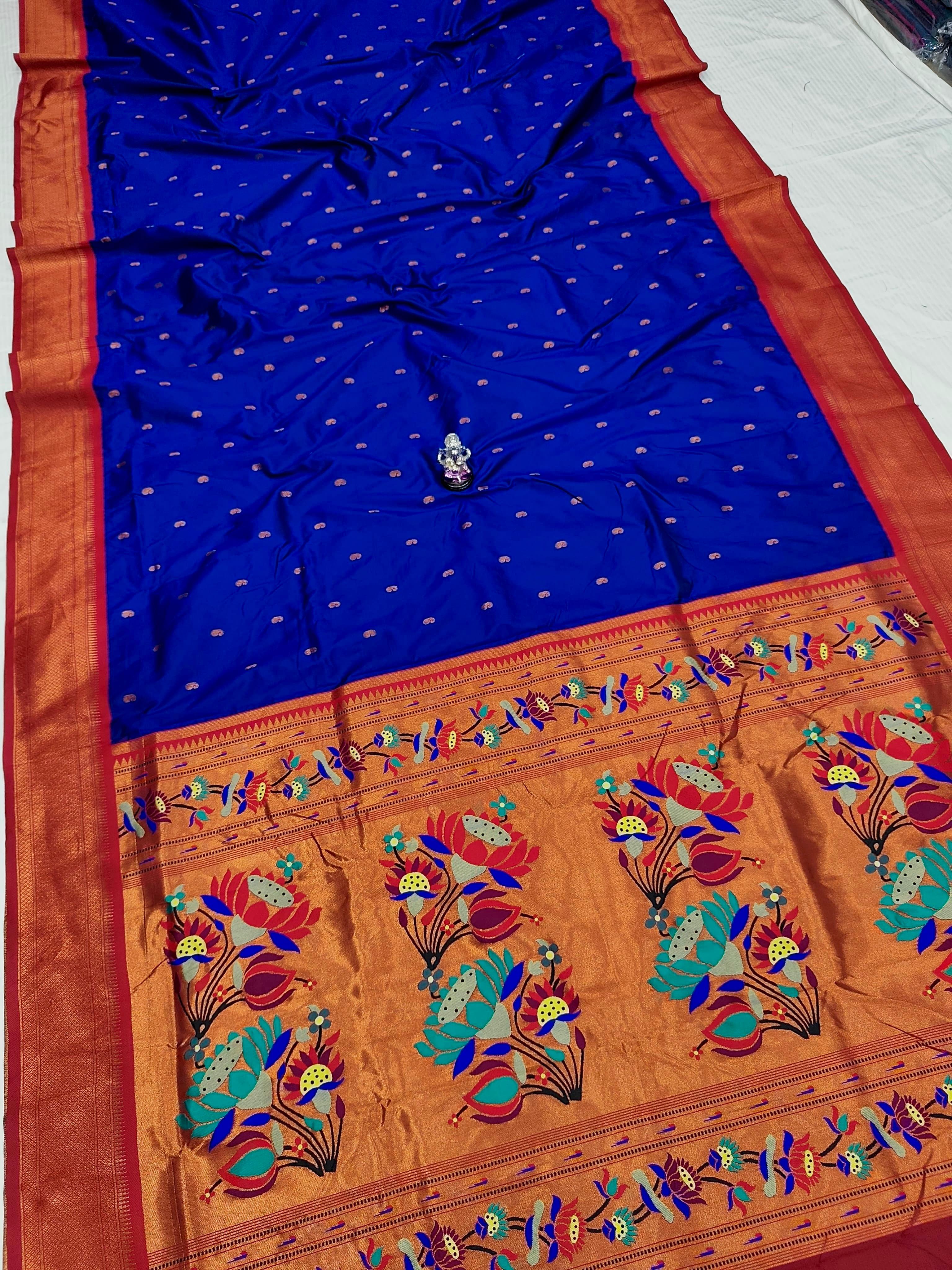 Premium Shrija Kadiyal Paithani Silk Saree with all-over zari buttis, exclusive contrast blouse, and rich double borders — perfect for weddings, festivals & special occasions.