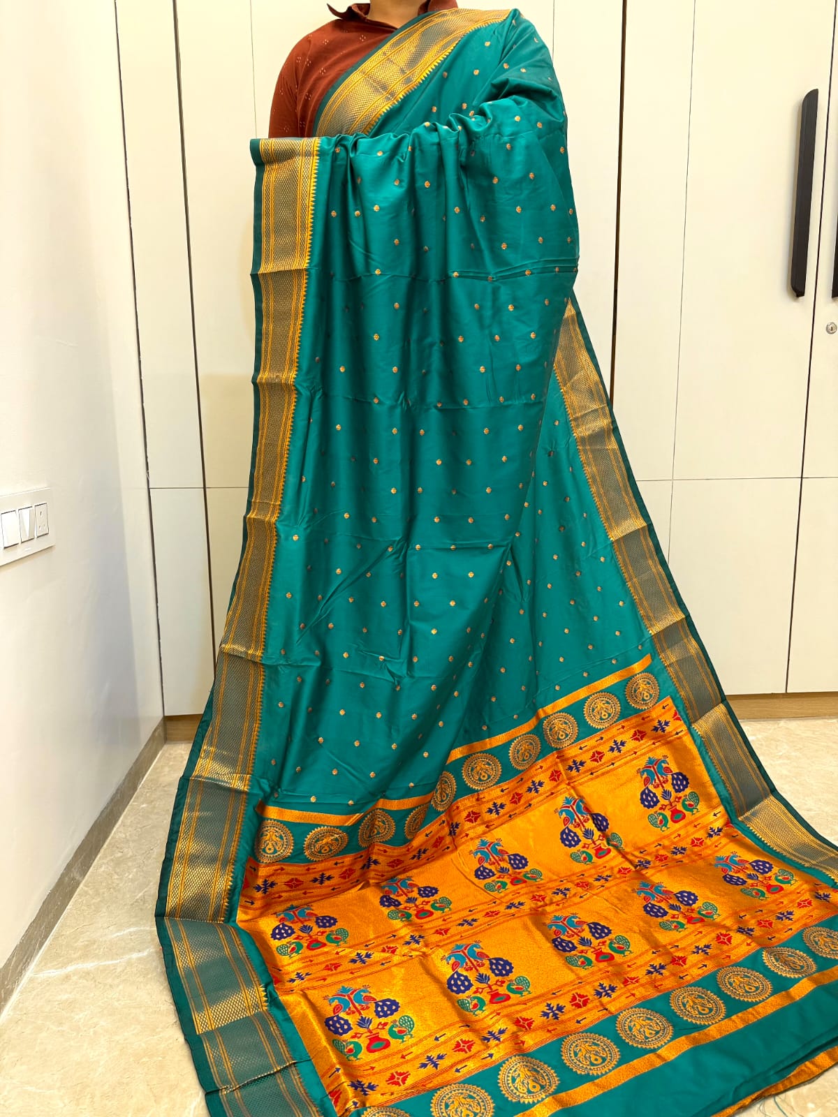 Experience timeless elegance with our New Kalanjali Paithani Saree, crafted from Premium Soft Silk and adorned with rich Zari Weaving.