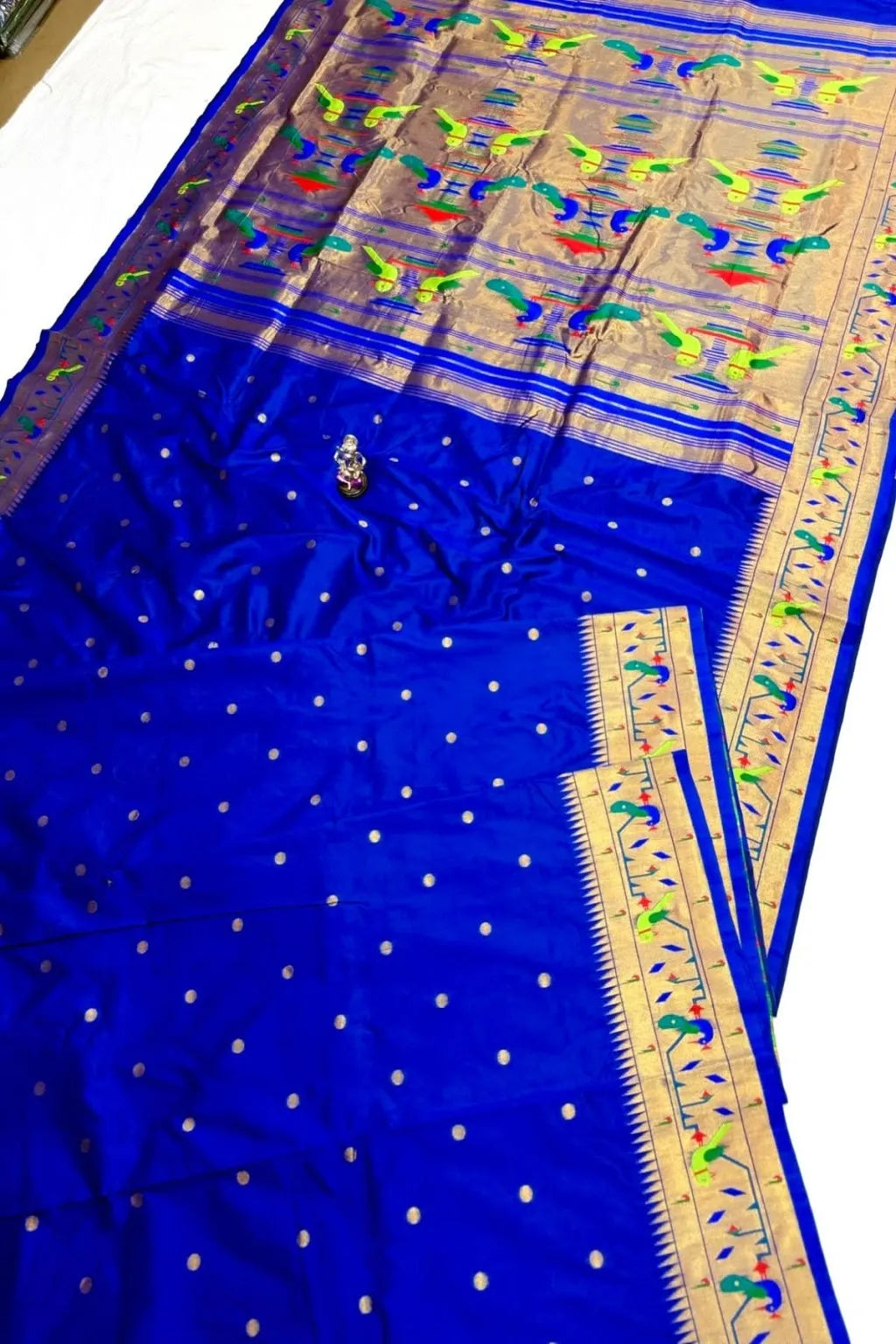 Shop premium Katan Silk Semi Mor & Popat Brocade Paithani Saree with traditional peacock and parrot pallu design and all-over zari butti. Perfect for weddings & festive wear.