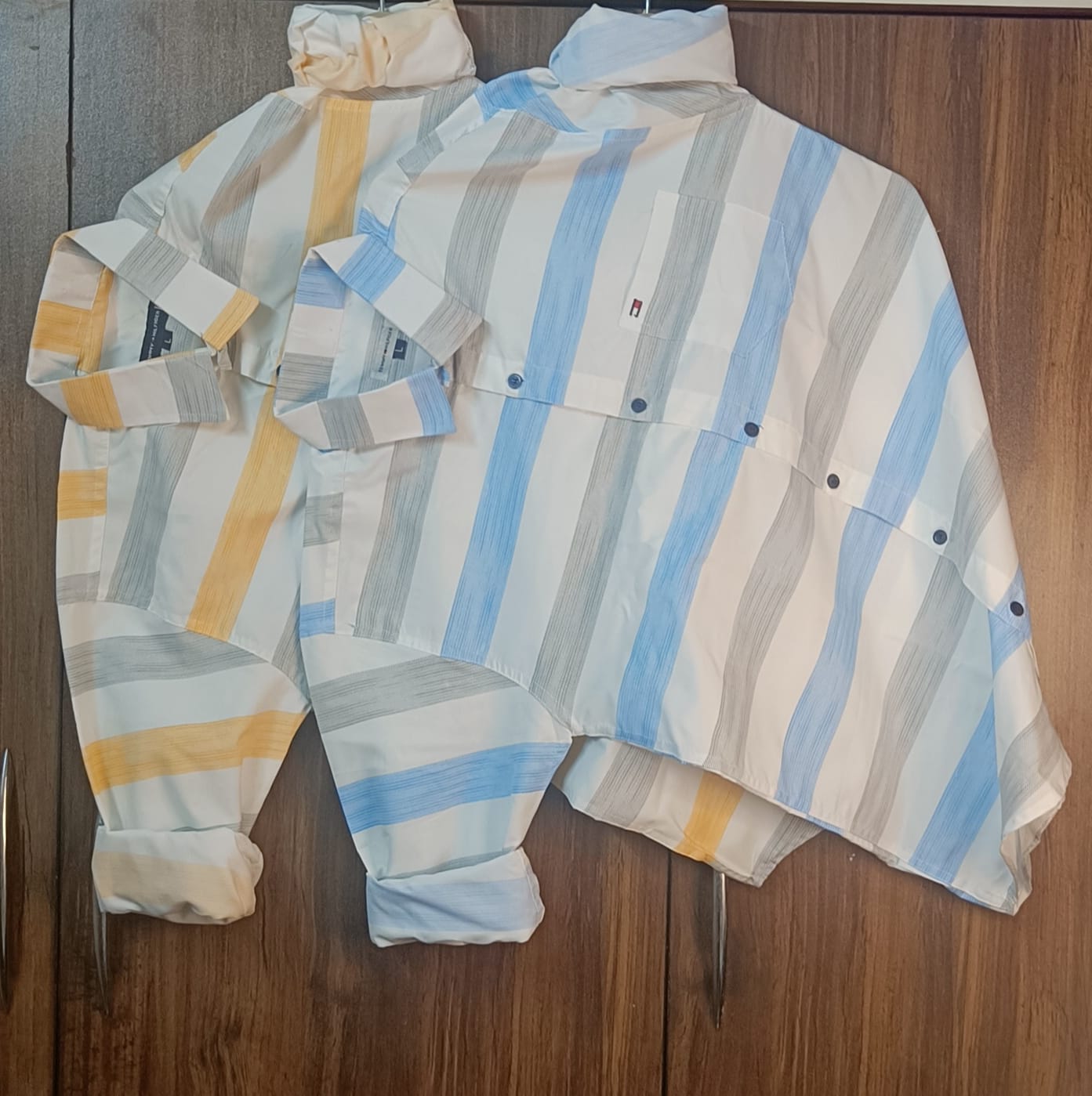 Tommy Hilfiger Cotton Premium Regular Fit Lining Shirt – Stylish full sleeve lining shirt crafted in breathable cotton. Perfect for casual and office wear, available in Yellow &amp; Green. Sizes: M, L, XL.