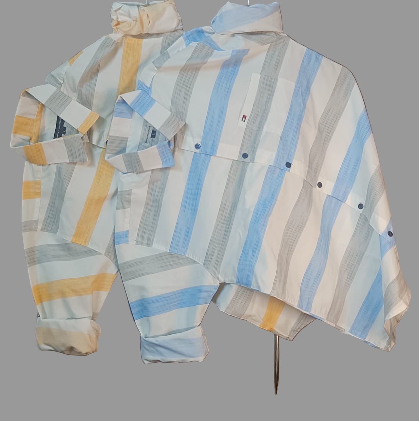 Tommy Hilfiger Cotton Premium Regular Fit Lining Shirt – Stylish full sleeve lining shirt crafted in breathable cotton. Perfect for casual and office wear, available in Yellow &amp; Green. Sizes: M, L, XL.