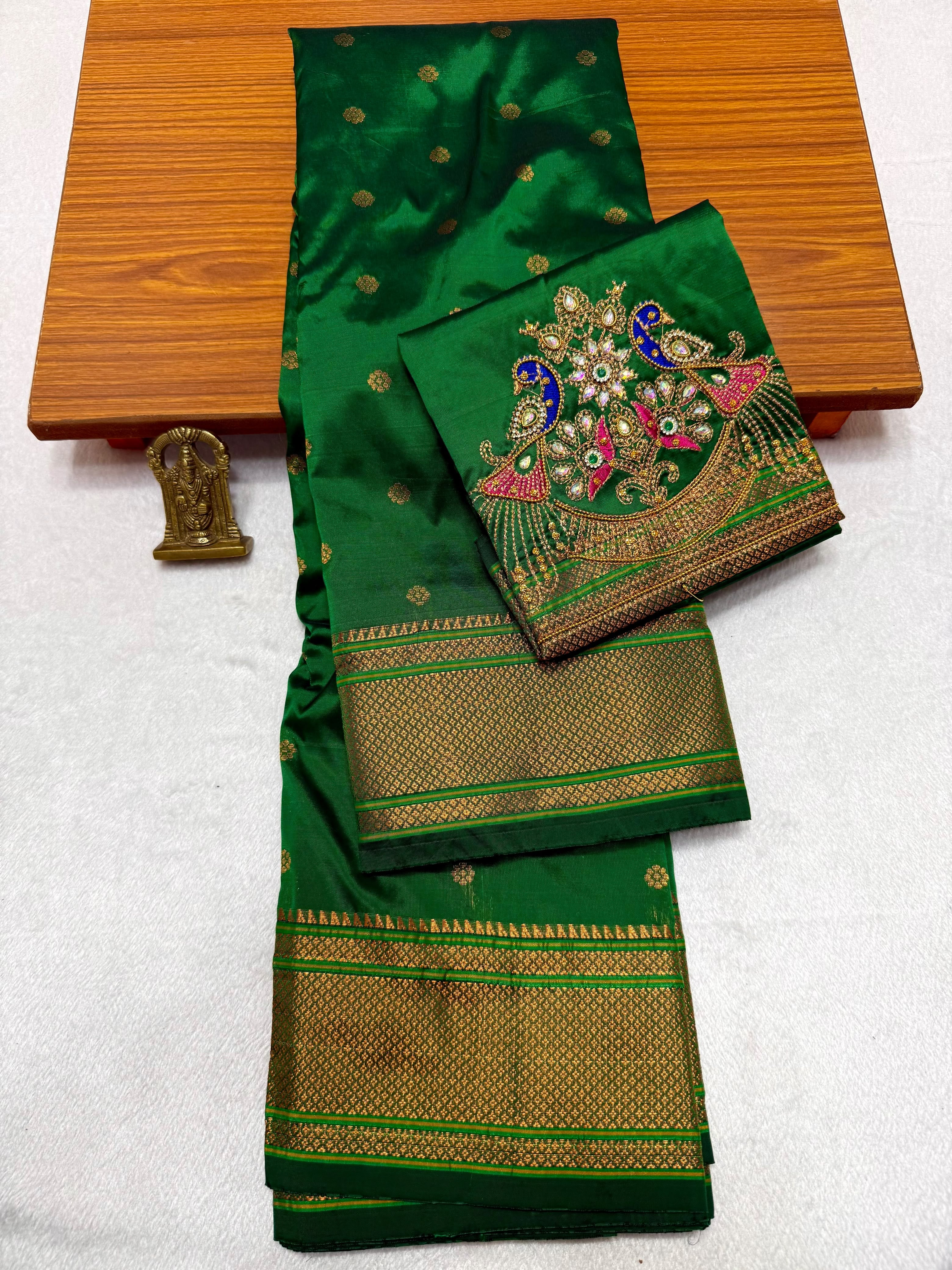 Shop elegant Pure Silk Copy Kalanjali Paithani Sarees featuring all-over butti design, rich pallu, premium Tana silk fabric, and exquisite Aari work blouse piece. Premium quality ethnic wear for weddings, festivals, and special occasions.