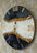 Add a touch of luxury and artistic elegance to your space with the NAVYA Handmade Resin Wall Clock. Expertly crafted using premium-quality resin, this designer clock showcases a mesmerizing marble and agate-inspired pattern with flowing teal, white, and subtle gold accents—making every piece truly one of a kind.