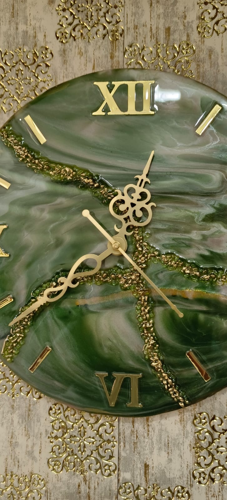 Add a touch of luxury and artistic elegance to your space with the NAVYA Handmade Resin Wall Clock. Expertly crafted using premium-quality resin, this designer clock showcases a mesmerizing marble and agate-inspired pattern with flowing teal, white, and subtle gold accents—making every piece truly one of a kind.