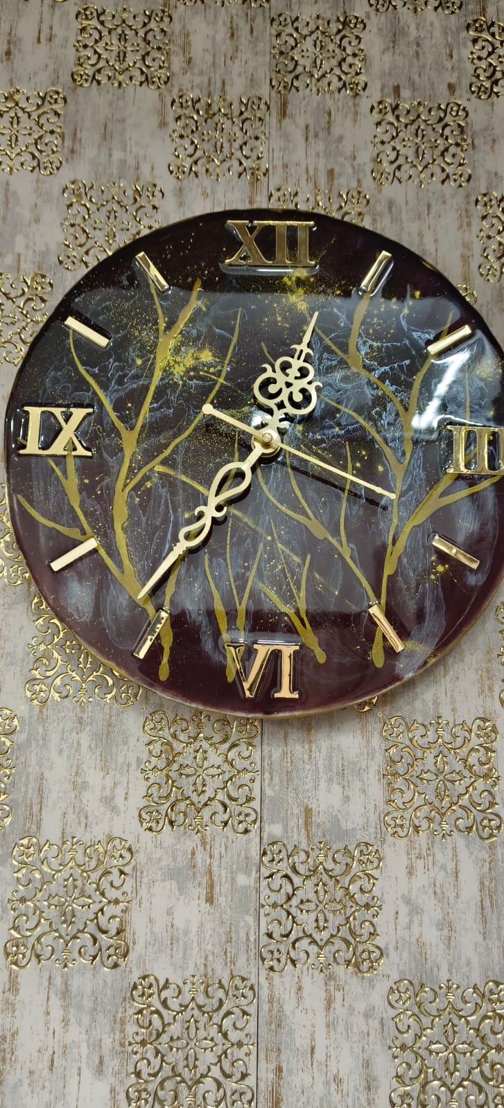 Add a touch of luxury and artistic elegance to your space with the NAVYA Handmade Resin Wall Clock. Expertly crafted using premium-quality resin, this designer clock showcases a mesmerizing marble and agate-inspired pattern with flowing teal, white, and subtle gold accents—making every piece truly one of a kind.