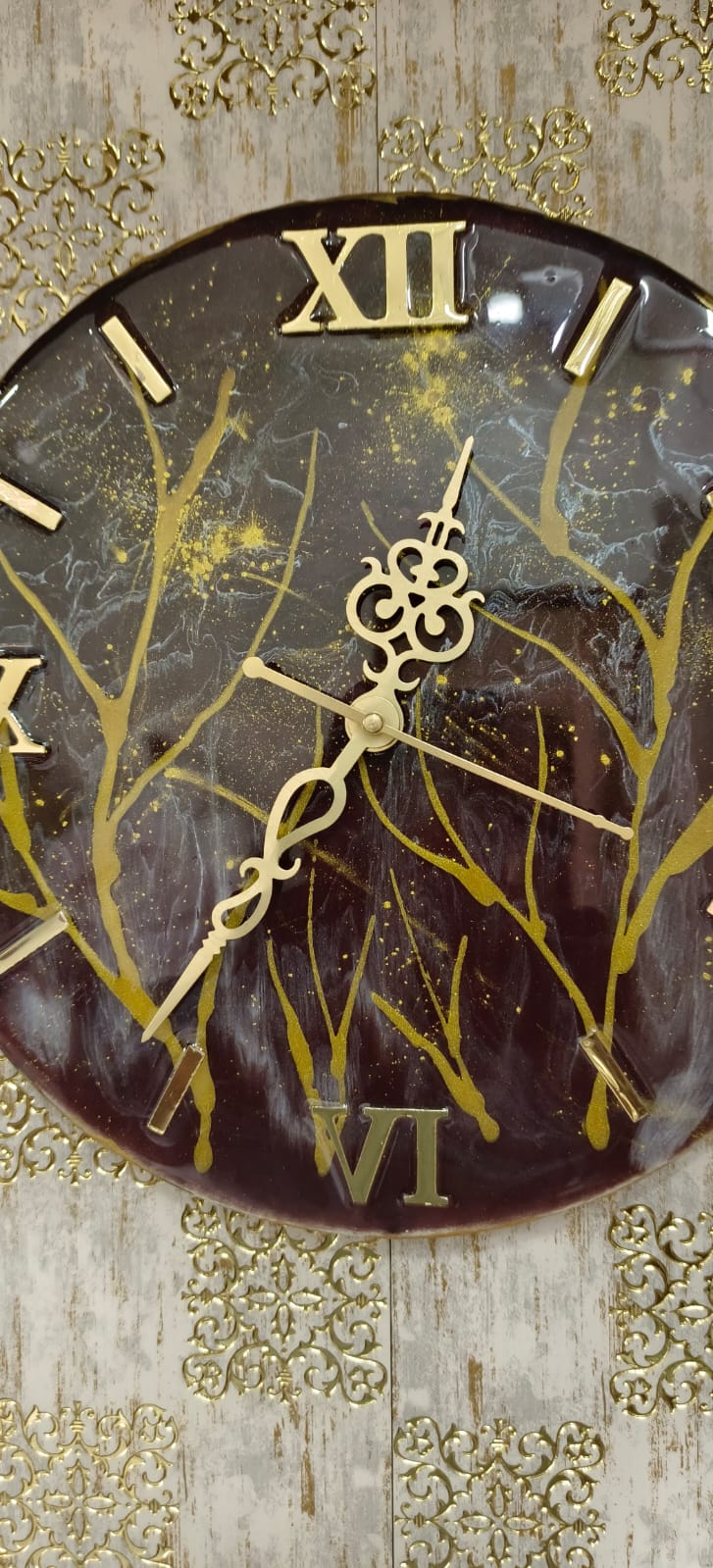 Add a touch of luxury and artistic elegance to your space with the NAVYA Handmade Resin Wall Clock. Expertly crafted using premium-quality resin, this designer clock showcases a mesmerizing marble and agate-inspired pattern with flowing teal, white, and subtle gold accents—making every piece truly one of a kind.