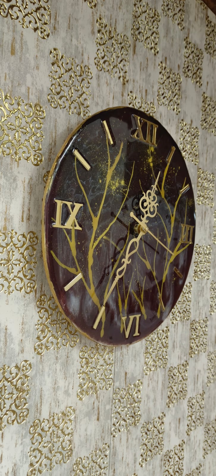Add a touch of luxury and artistic elegance to your space with the NAVYA Handmade Resin Wall Clock. Expertly crafted using premium-quality resin, this designer clock showcases a mesmerizing marble and agate-inspired pattern with flowing teal, white, and subtle gold accents—making every piece truly one of a kind.