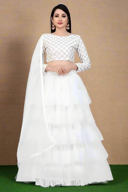 Ruffle White Lehenga Choli Set in Net & Satin Semi Stitched. Step out in style with our Ruffle white Lehenga Choli Set. Made with high-quality net and satin materials, this semi-stitched ensemble offers a modern twist on traditional Indian fashion. The ruffled design adds a touch of elegance, making it perfect for any special occasion. Stand out with this unique and stylish outfit.