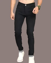 Load image into Gallery viewer, Flying Plain Mid Rise BLACK Jeans for Men

Sizes: 28, 30,32

Color: Black
Fabric: Denim
Type: Mid-Rise Jeans
Style: Solid
Design Type: Slim Fit
Waist Closure: Button

These stylish-fancy black denim solid mid-rise jeans are the perfect addition to any fashion-forward man&#39;s wardrobe. Made with high-quality denim, these jeans offer both comfort and style. With a classic mid-rise fit, they are versatile and can be dressed up or down for any occasion. Perfect for the modern man on-the-go.