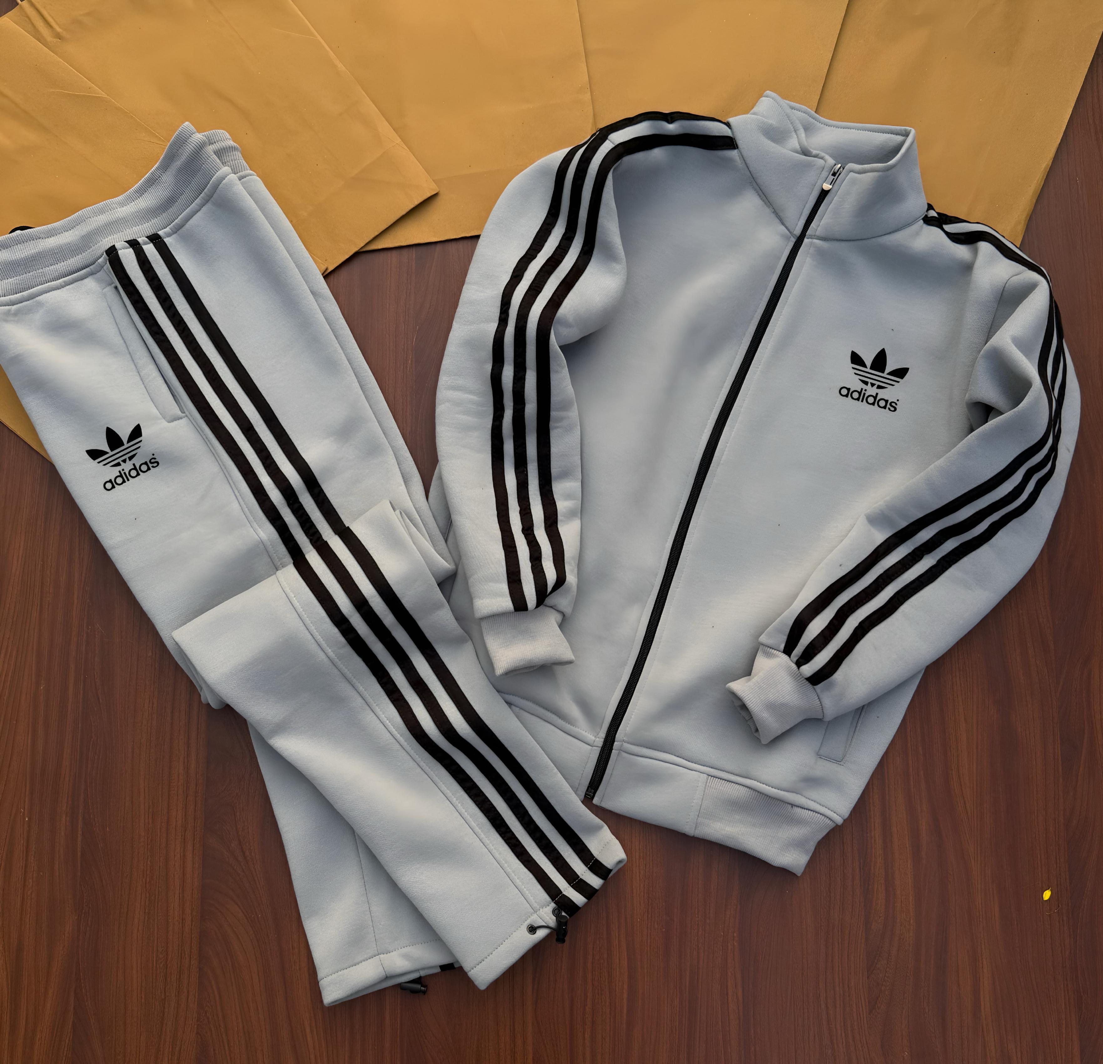 Stay warm and stylish this winter with our premium-quality ADIDAS zipper tracksuit, crafted for maximum comfort and durability.