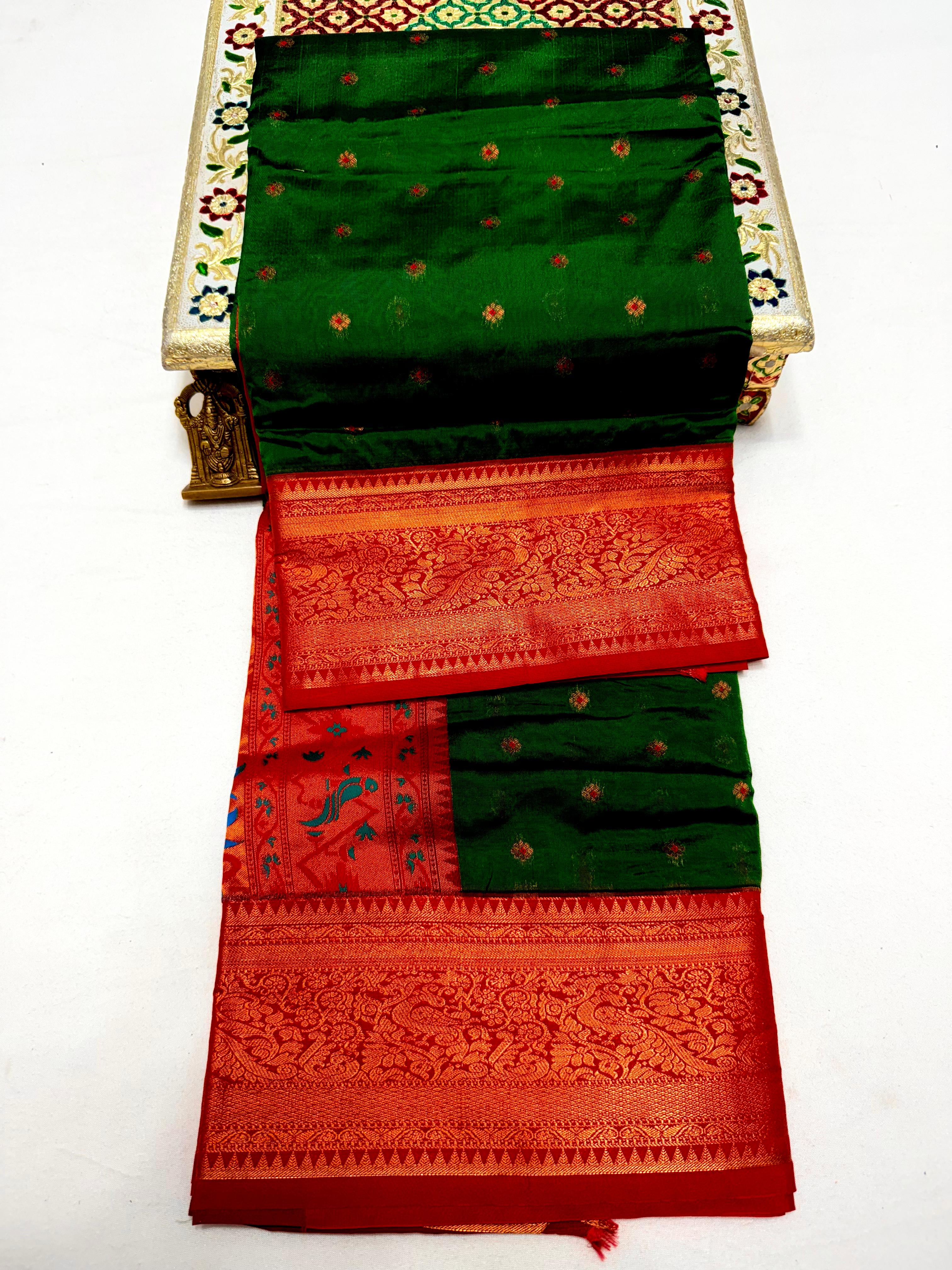 Make a grand statement this wedding season with our exclusive Dhanashree Kanjivaram Paithani Saree, crafted in rich silk with traditional detailing.