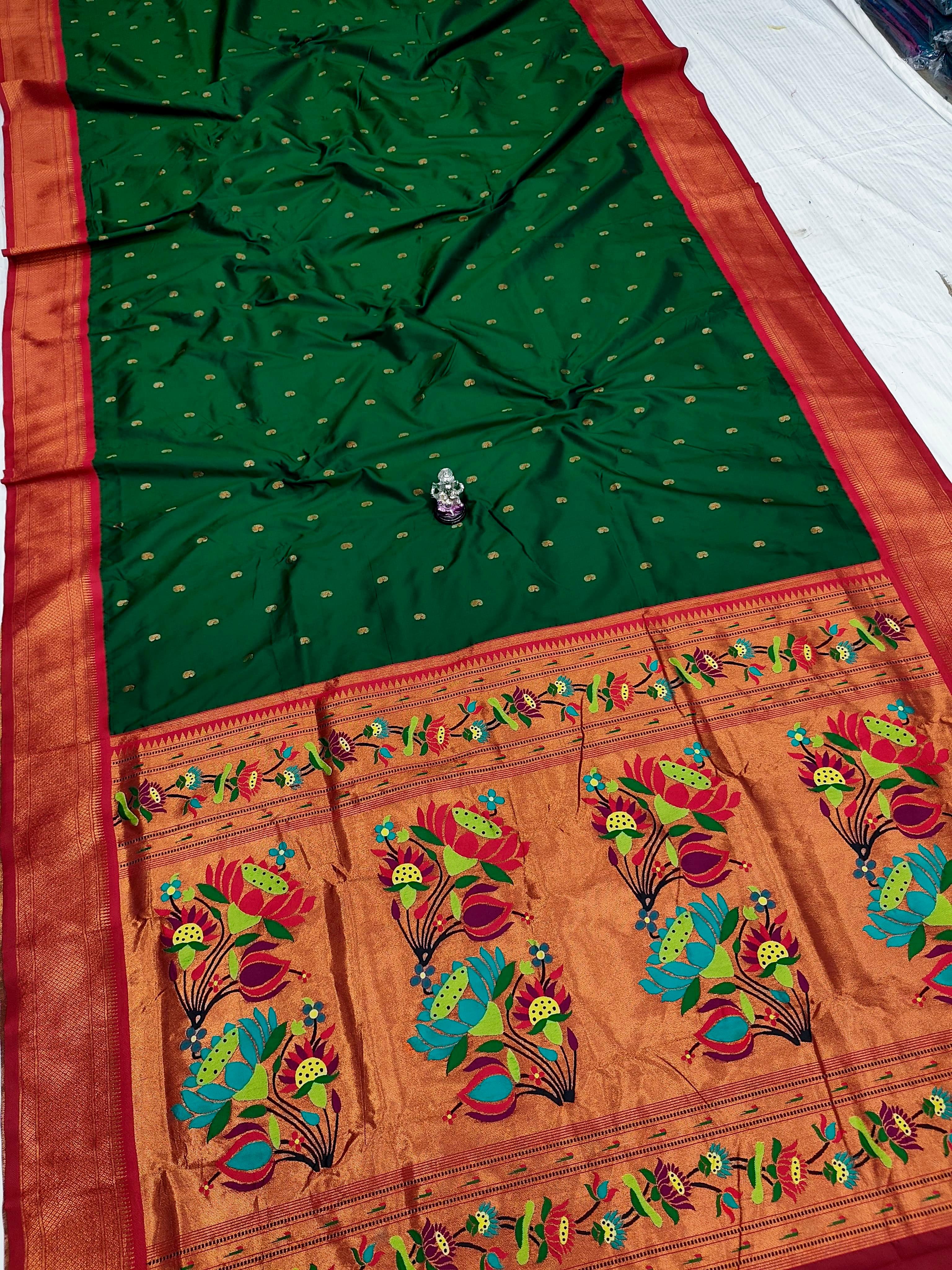 Premium Shrija Kadiyal Paithani Silk Saree with all-over zari buttis, exclusive contrast blouse, and rich double borders — perfect for weddings, festivals & special occasions.