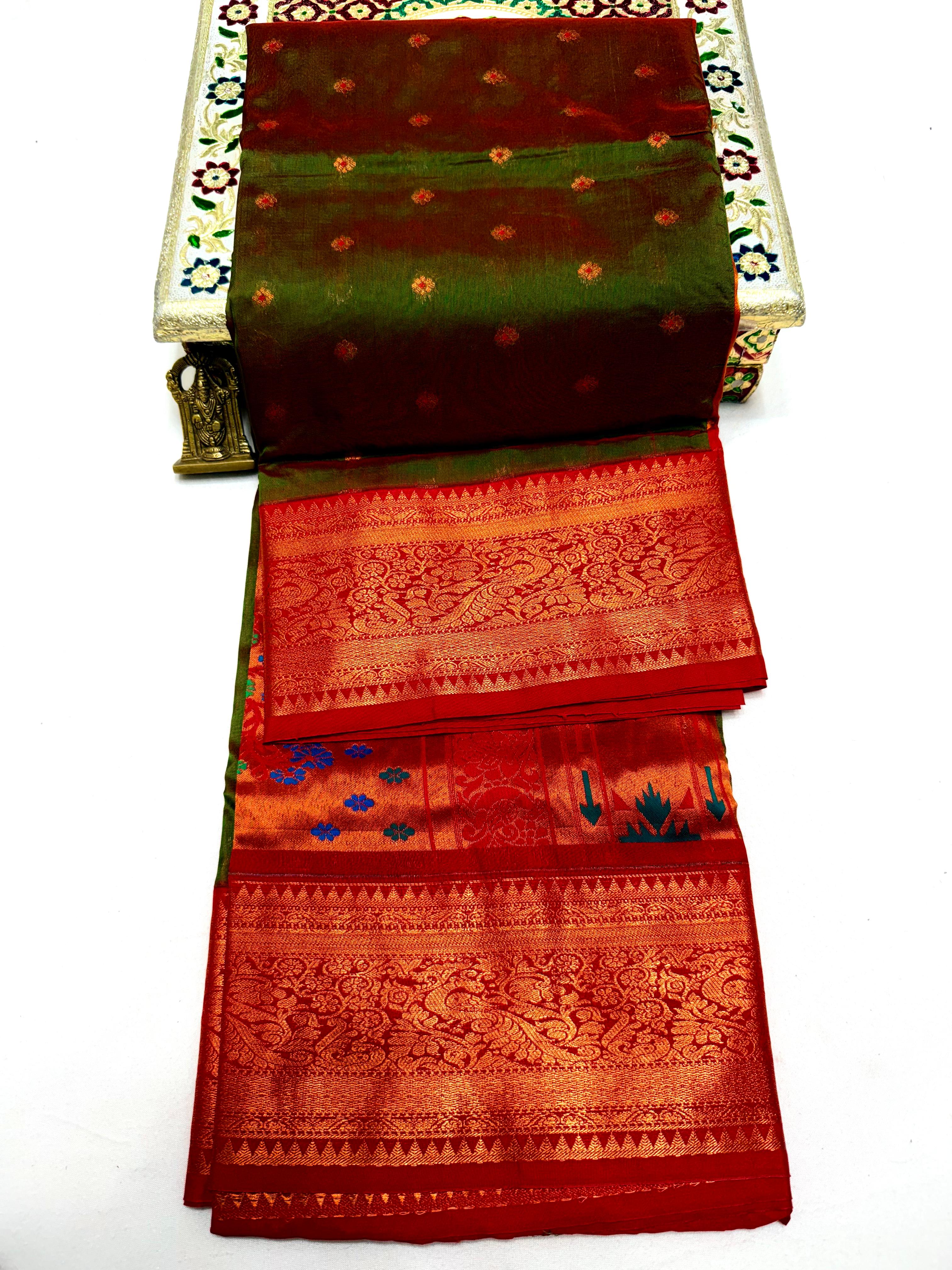 Make a grand statement this wedding season with our exclusive Dhanashree Kanjivaram Paithani Saree, crafted in rich silk with traditional detailing.