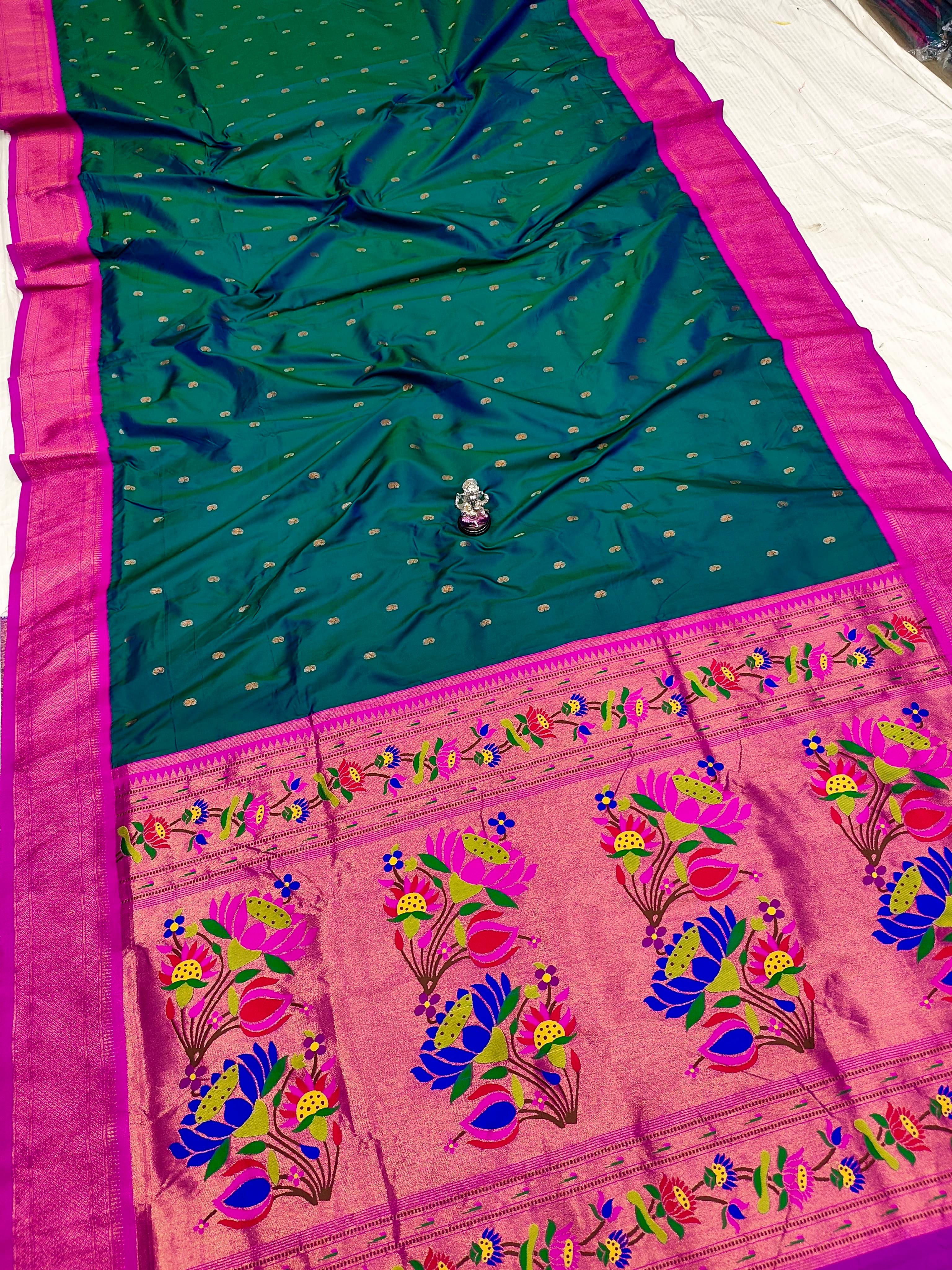 Premium Shrija Kadiyal Paithani Silk Saree with all-over zari buttis, exclusive contrast blouse, and rich double borders — perfect for weddings, festivals & special occasions.