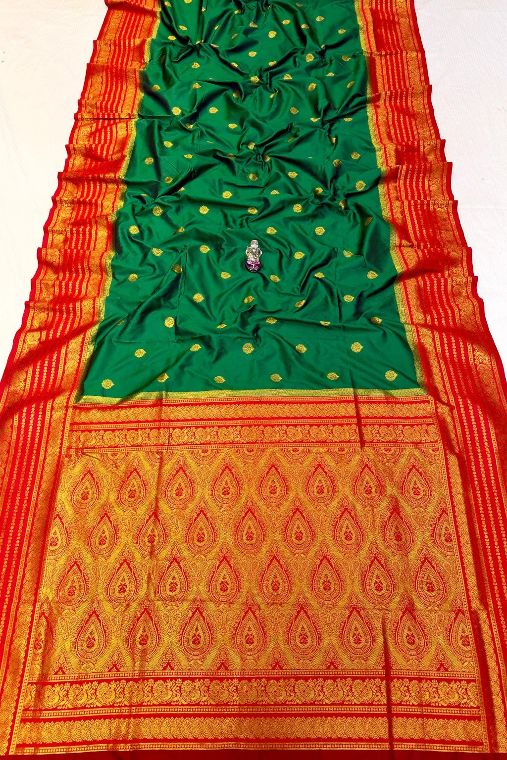 Shop Rajashri Kanjivaram Paithani Saree online at best price. Premium Katan silk feel with zari butti and Meena work, ideal for weddings, festivals, and traditional occasions.