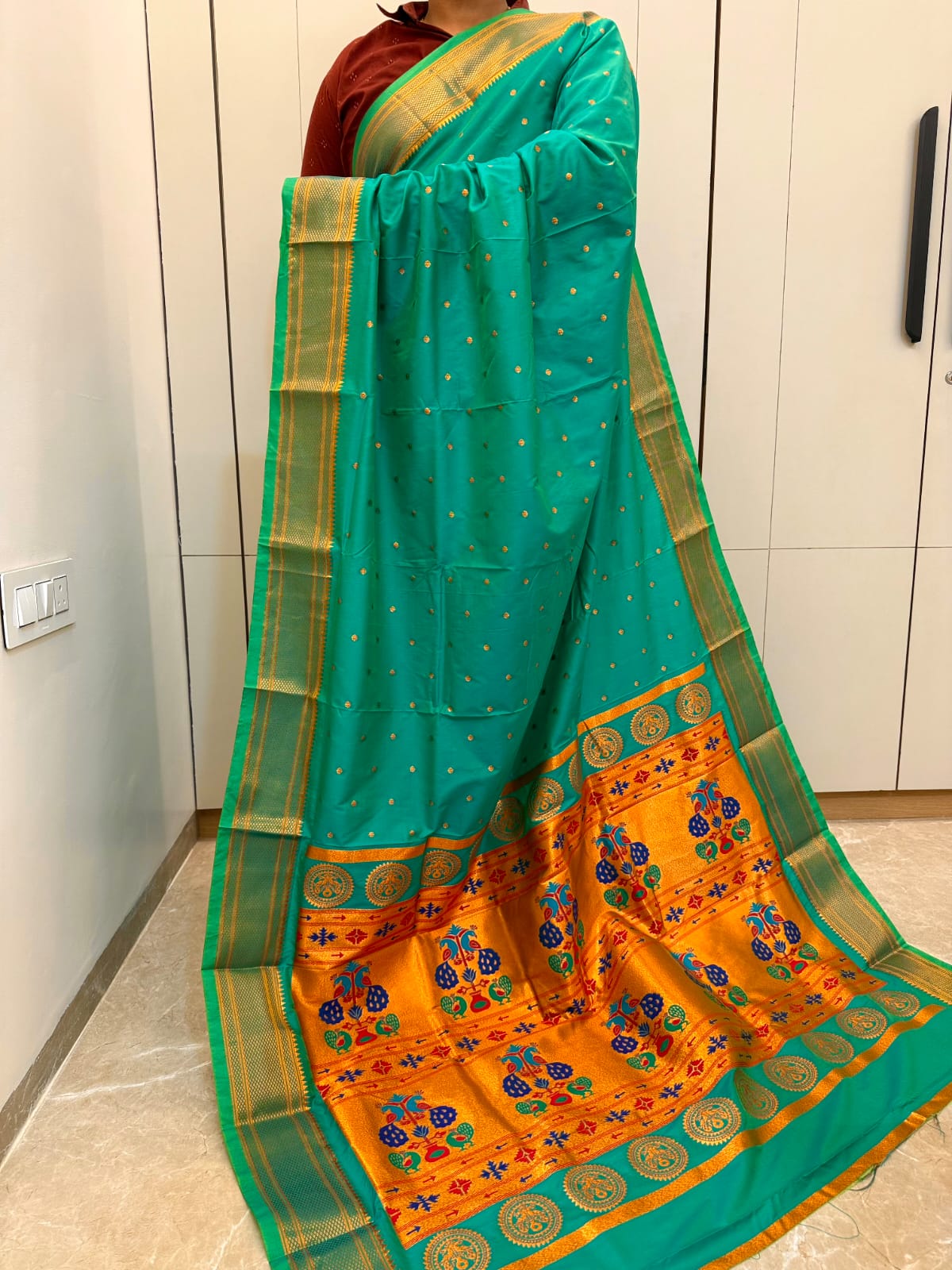 Experience timeless elegance with our New Kalanjali Paithani Saree, crafted from Premium Soft Silk and adorned with rich Zari Weaving.