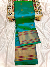 Load image into Gallery viewer, Traditional Kalanjali Paithani, Maharani Pallu with running Blouse. &nbsp;This traditional Yeola Kalanjali Paithani features a rich Maharani Pallu and intricate all over buttis. Made with premium shiny Tana Softy Silk and 100% premium Zari, it offers a luxurious look and feel. The running blouse piece allows for a customized fit. Elevate your wardrobe with this premium paithani saree.&nbsp;Traditional Yeola Kalanjali Paithani