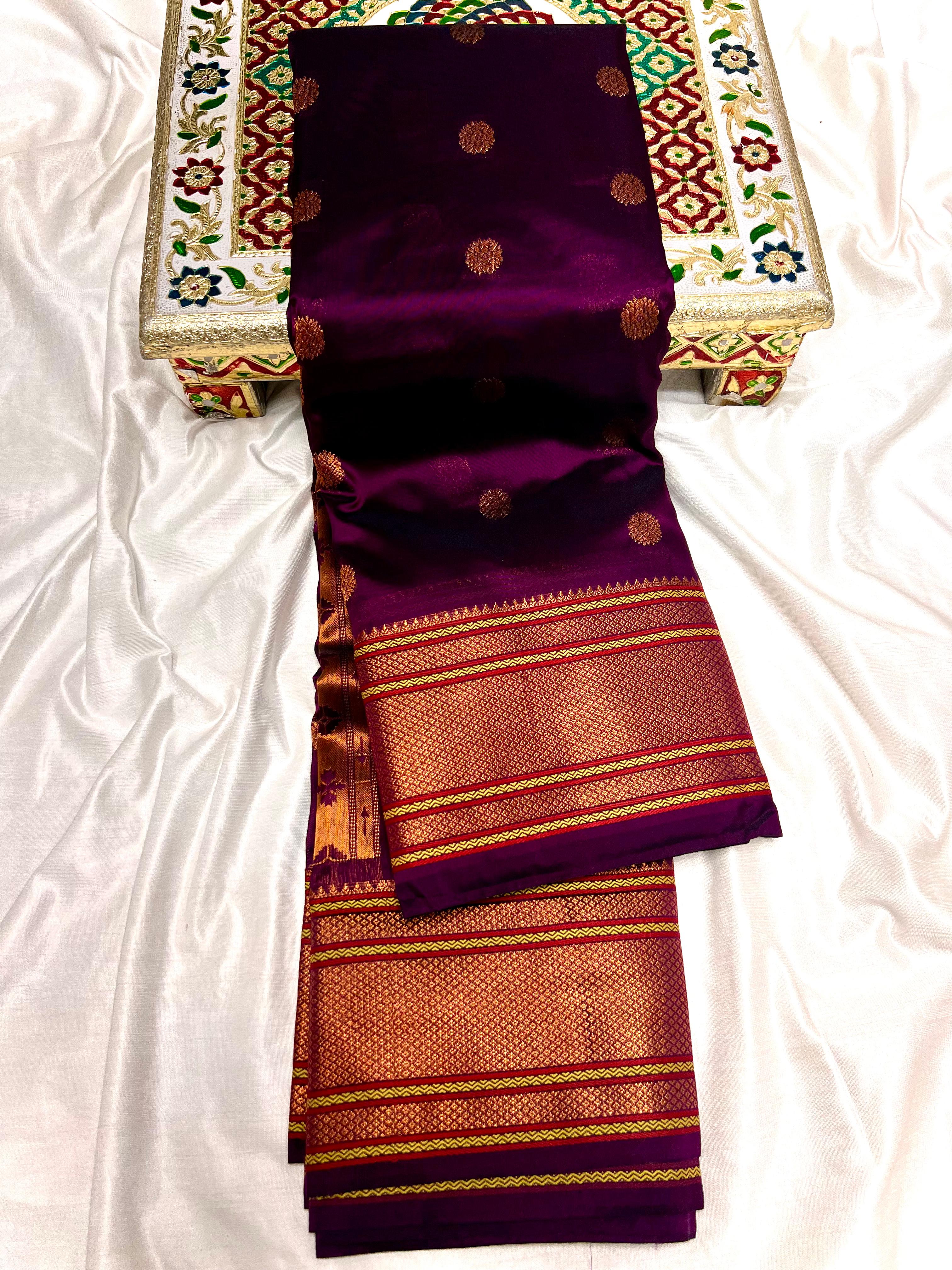 Traditional Kalanjali Paithani, Maharani Pallu with running Blouse. &nbsp;This traditional Yeola Kalanjali Paithani features a rich Maharani Pallu and intricate all over buttis. Made with premium shiny Tana Softy Silk and 100% premium Zari, it offers a luxurious look and feel. The running blouse piece allows for a customized fit. Elevate your wardrobe with this premium paithani saree.&nbsp;Traditional Yeola Kalanjali Paithani