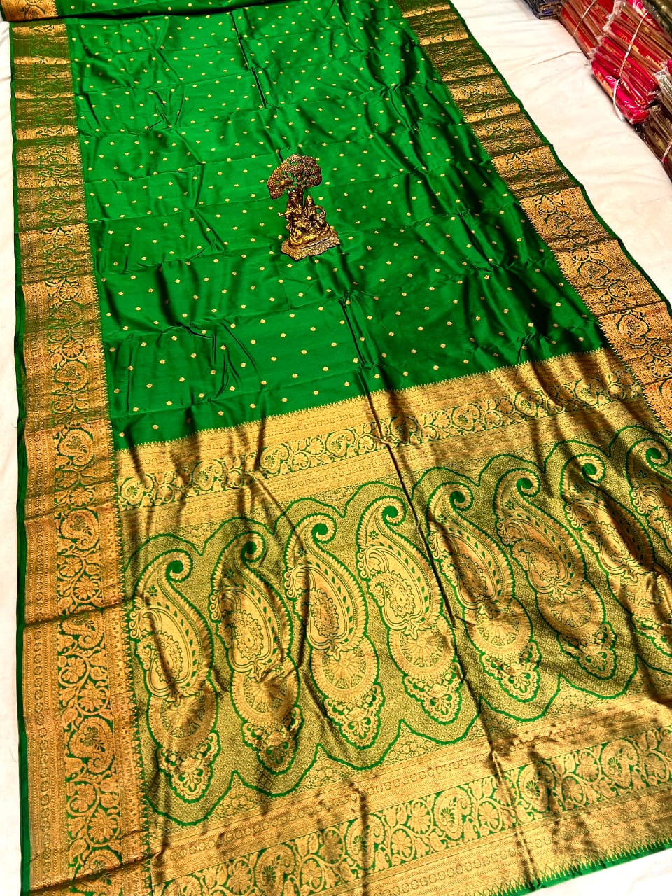 Kanjivaram Premier Tana Soft Silk Piathani Zari Butti with running Blouse.

Saree: Kanjivaram Paithani
Colors: Maroon, Blue, Navy Blue, Dark Green, Green, Red, Turqoise

Butti: All over Zari Butti

Pallu: Rich Pallu

Blouse: Running Blouse Piece

Fabrics: Premium Tana Soft Silk


This gorgeous Kanjivaram silk saree blends traditional design with modern elegance. Made from the finest Tana soft silk, it features intricate Piathani zari butti work and comes with a running blouse piece. With a luxurious feel an