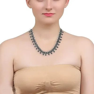 Voylla Morir Antique Oxidized German Silver Black Metal Kolhapuri Choker Necklace Tooth Pattern Choker Jewelry for Girls and Women

Sizes: free size
Color: Silver Black
Material: German Silver Black Metal
Pattern: Tooth Pattern
Made: of India
Toxic: Free Toxic and lead free
Length: 21 cm
Weight: 52.2 gram
Design Length: Adjustable
Gifting: Loved ones, Fiancee, Wife, mother, Sister, Friend, valentine, Birthday