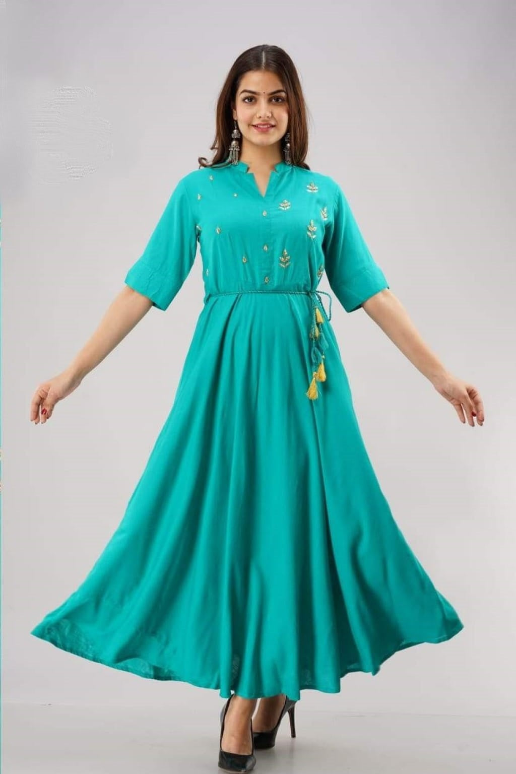 Shop stylish Navy, Ramagreen Rayon Slub embroidered flared long kurti for women. Elegant ethnic design with comfortable fabric, available in M, L, XL. Perfect for festive and casual wear.