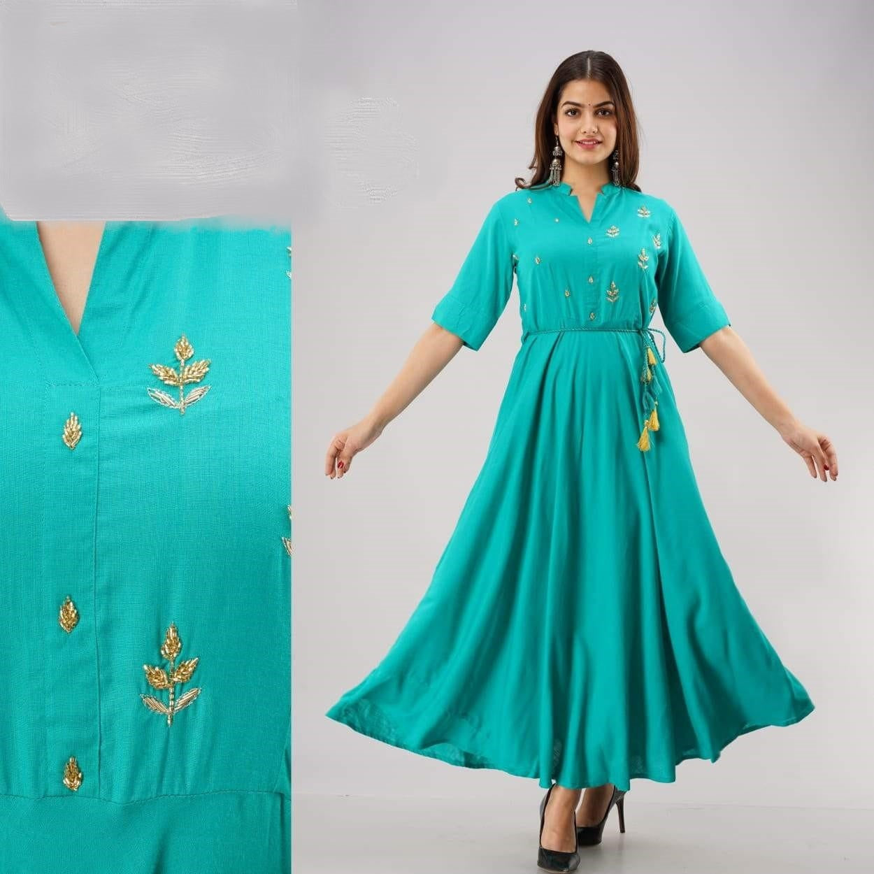 Shop stylish Navy, Ramagreen Rayon Slub embroidered flared long kurti for women. Elegant ethnic design with comfortable fabric, available in M, L, XL. Perfect for festive and casual wear.
