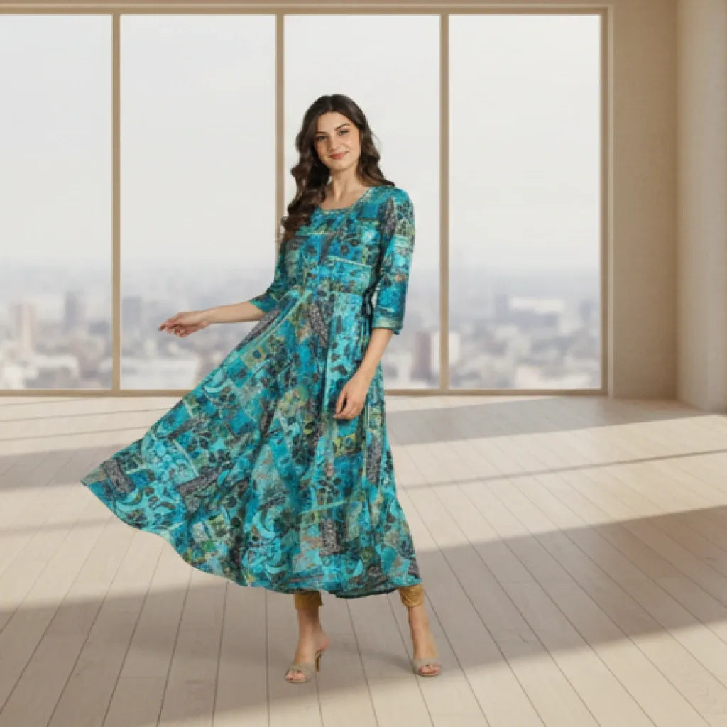 Shop elegant blue multi ethnic print long kurti in premium rayon slub with flared hem and dori bead detailing. Stylish and comfortable ethnic wear available in M and XXL.