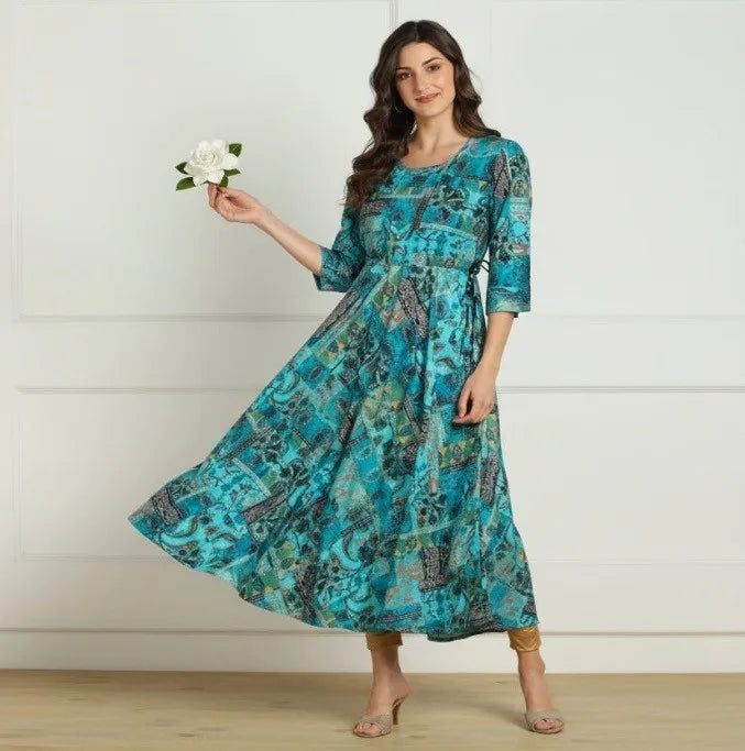 Shop elegant blue multi ethnic print long kurti in premium rayon slub with flared hem and dori bead detailing. Stylish and comfortable ethnic wear available in M and XXL.