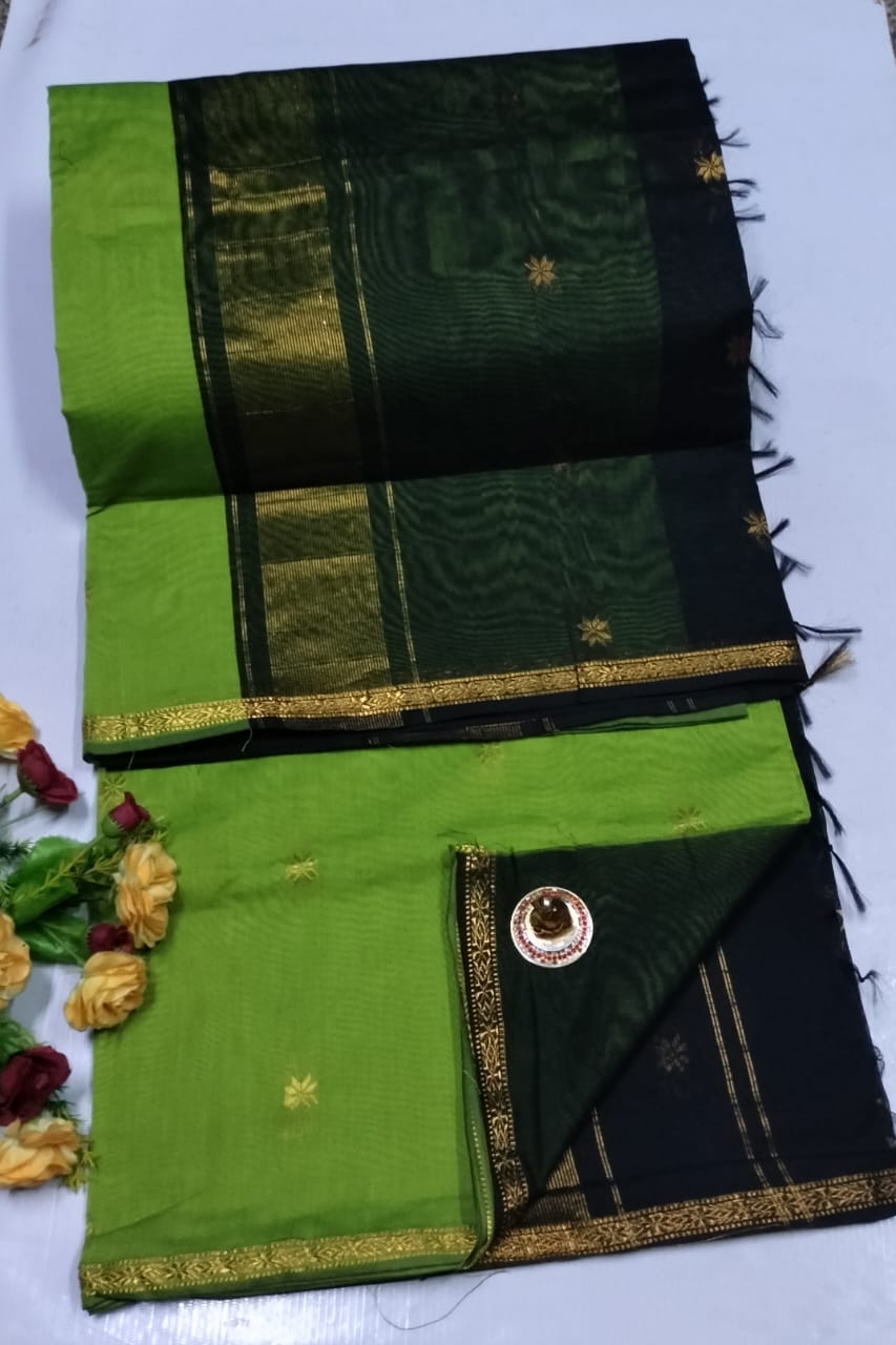 Green and black saree with gold border on a white background Premium Maheshwari Silk Cotton Sarees Gadwal-Inspired | Sleek Dual Borders | Contrast Pallu & Blouse.